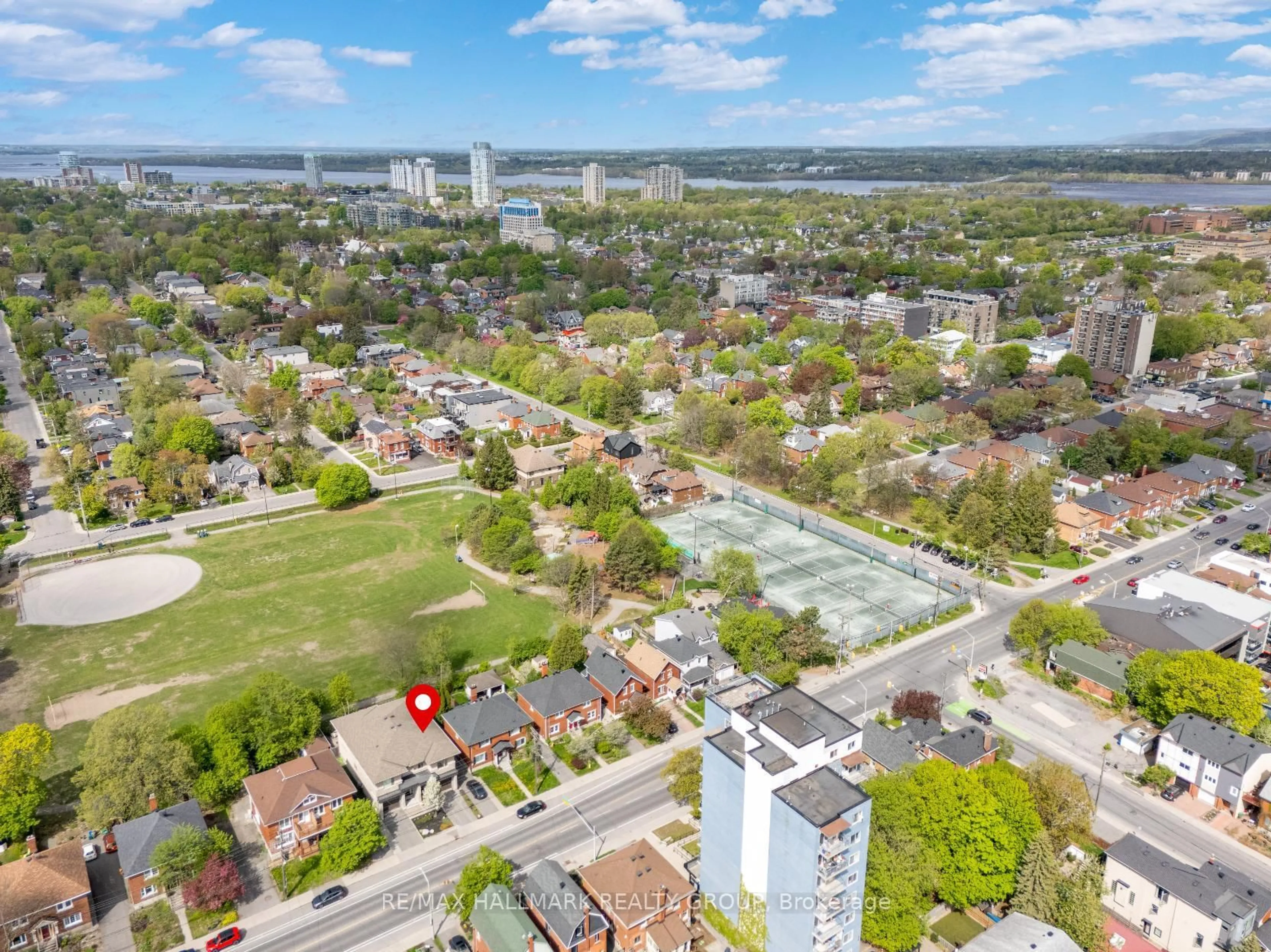 A pic from outside/outdoor area/front of a property/back of a property/a pic from drone, city buildings view from balcony for 206 Holland Ave #A, Ottawa Ontario K1Y 0Y5