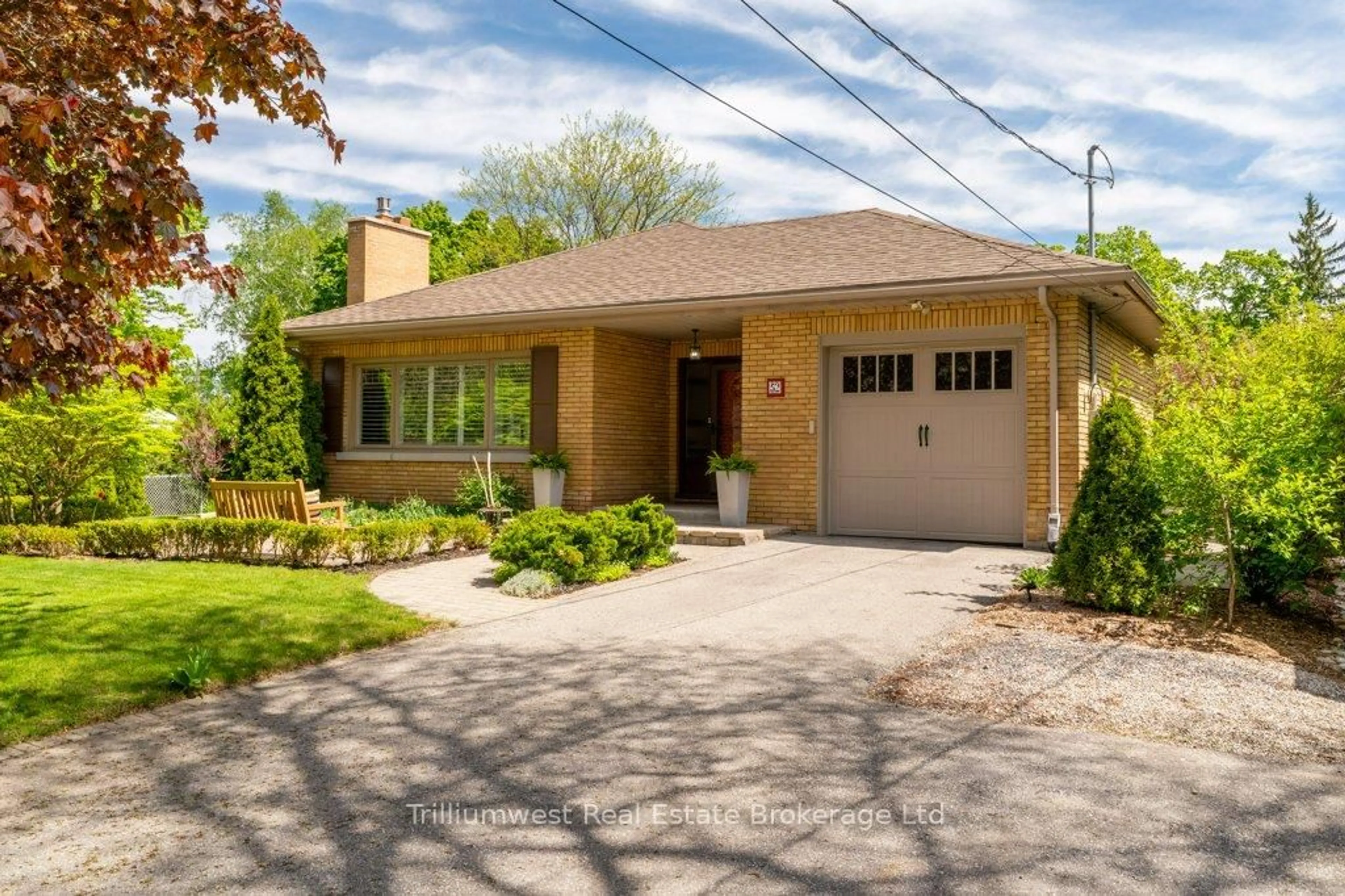 Home with brick exterior material, street for 52 Forest Hill Dr, Guelph Ontario N1G 2E6