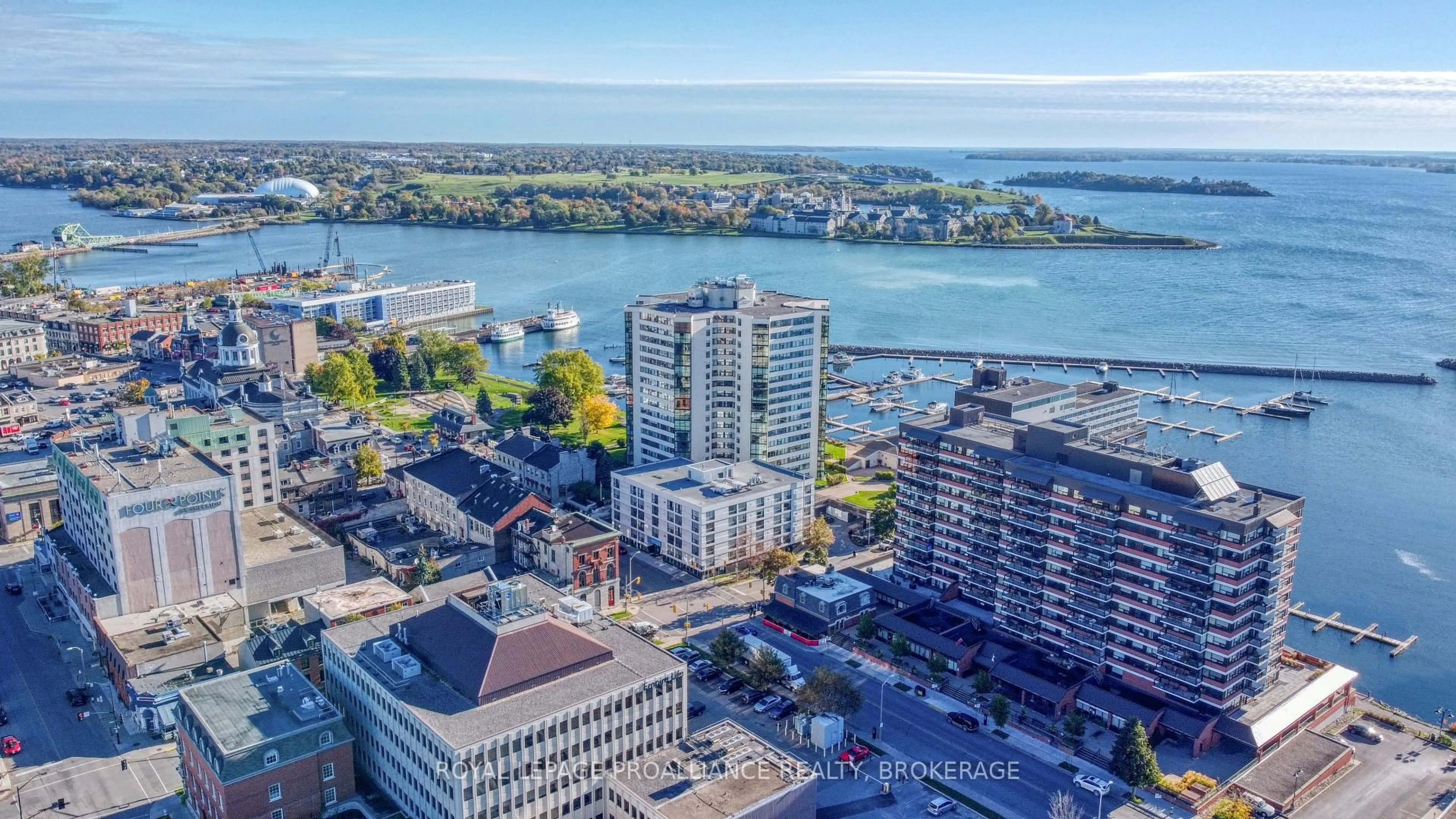 A pic from outside/outdoor area/front of a property/back of a property/a pic from drone, water/lake/river/ocean view for 165 ONTARIO St #702, Kingston Ontario K7L 2Y6