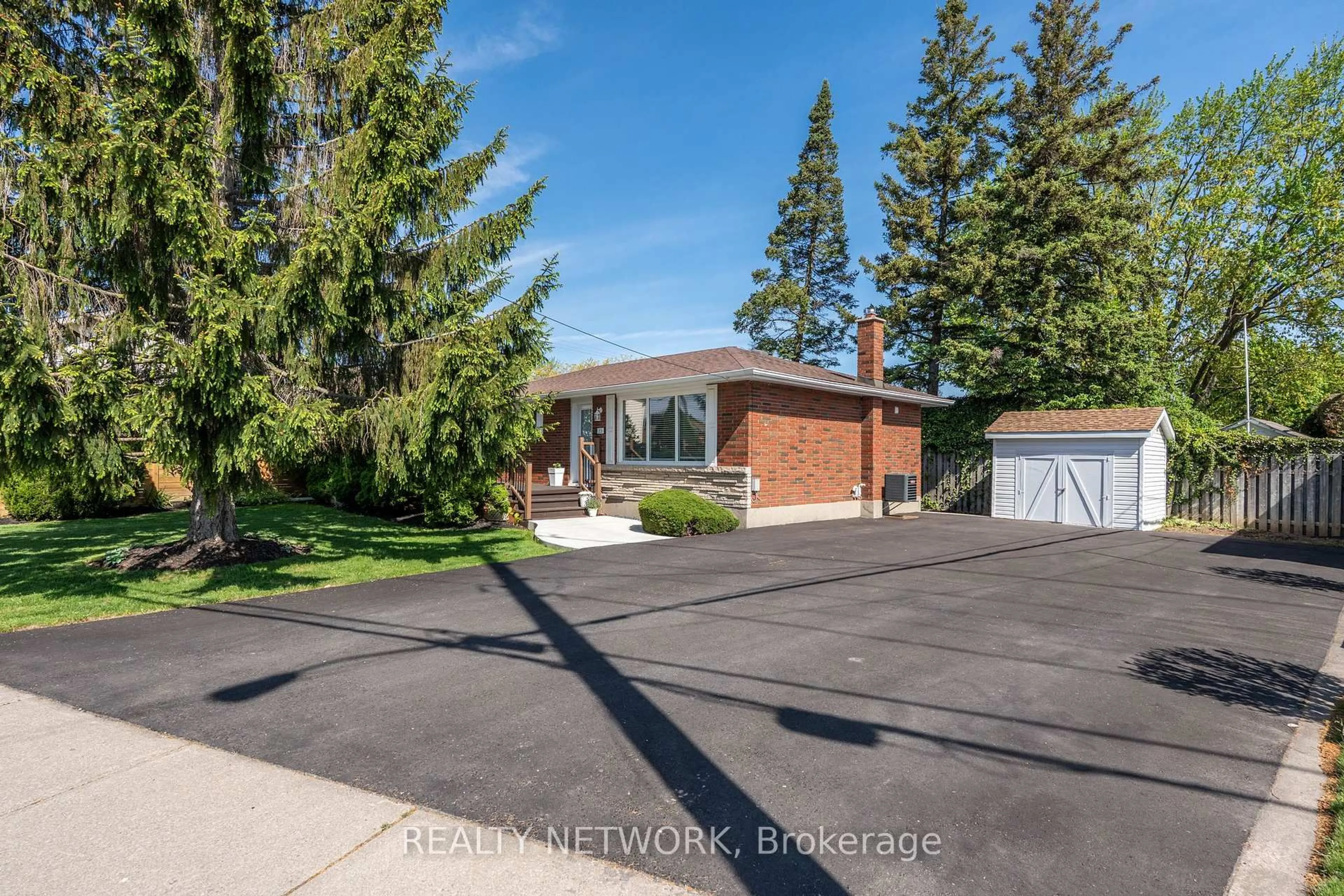 Home with brick exterior material, street for 75 Parnell Rd, St. Catharines Ontario L2M 1V8