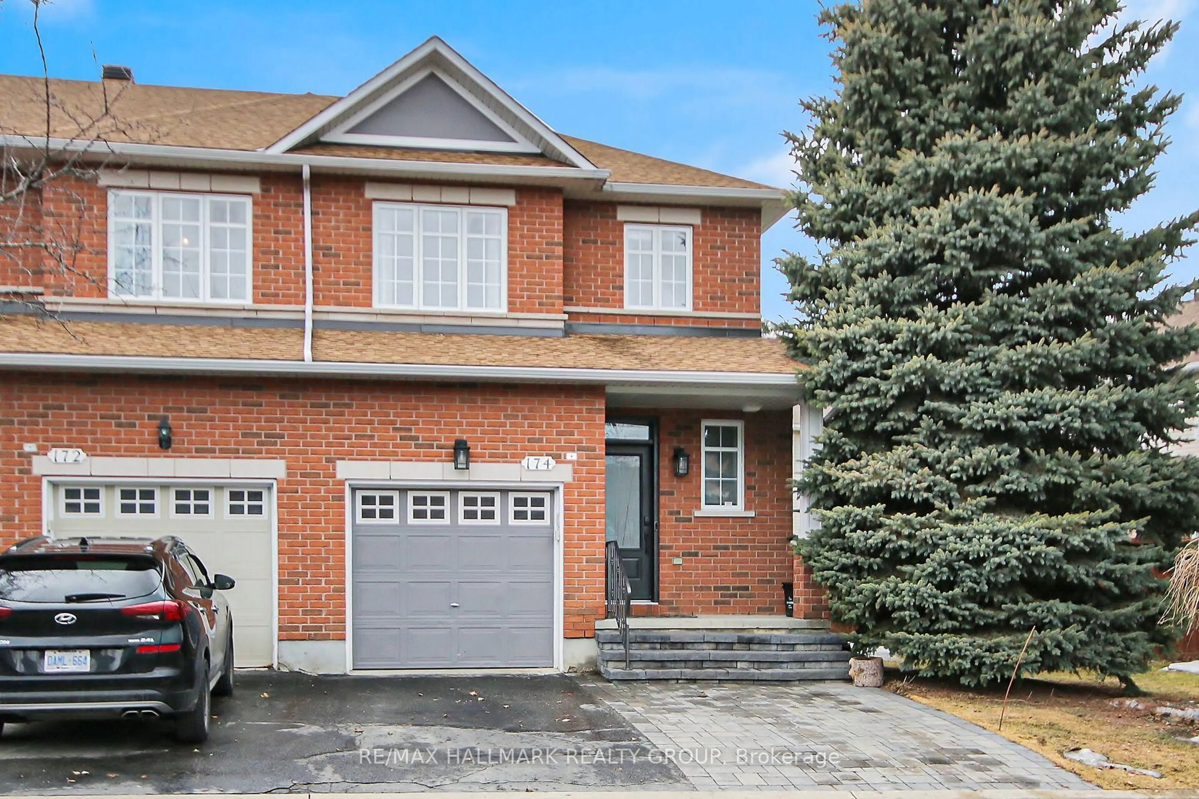 Home with brick exterior material, street for 174 Gatespark Private, Kanata Ontario K2T 1K9