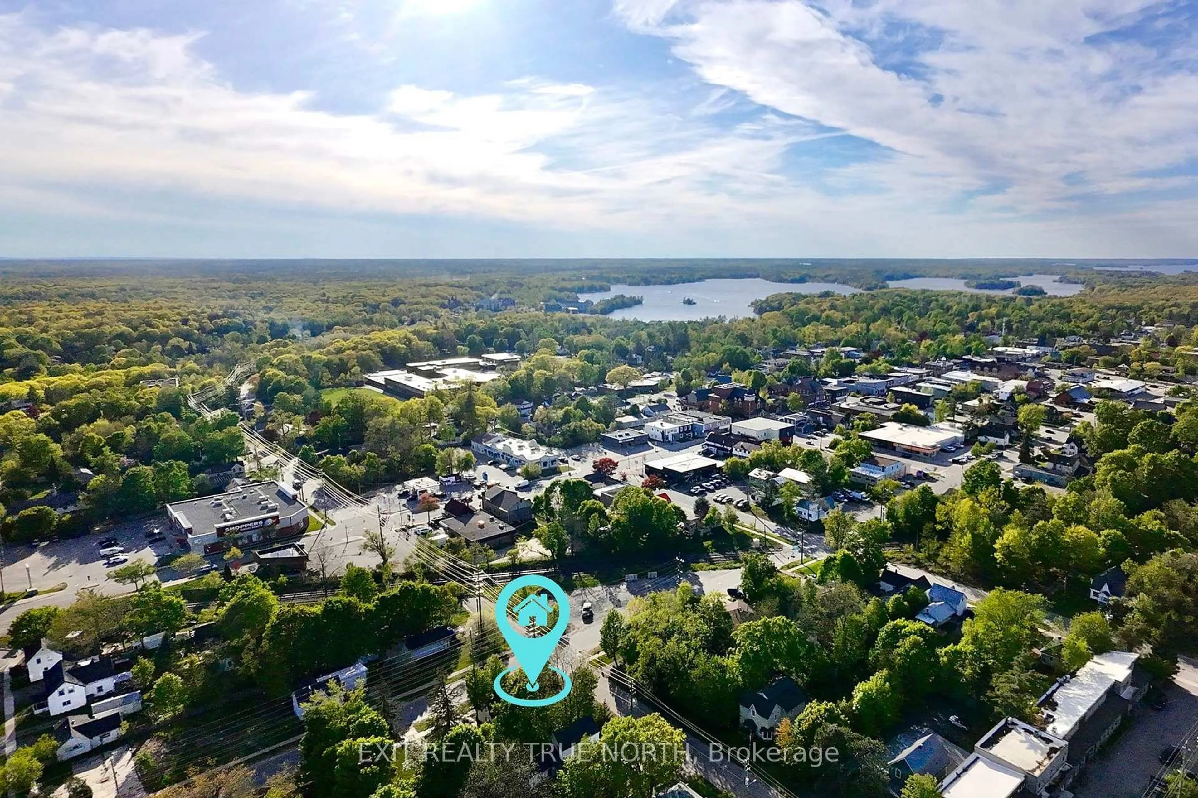 A pic from outside/outdoor area/front of a property/back of a property/a pic from drone, water/lake/river/ocean view for 211 Bishop St, Gravenhurst Ontario P1P 1J5