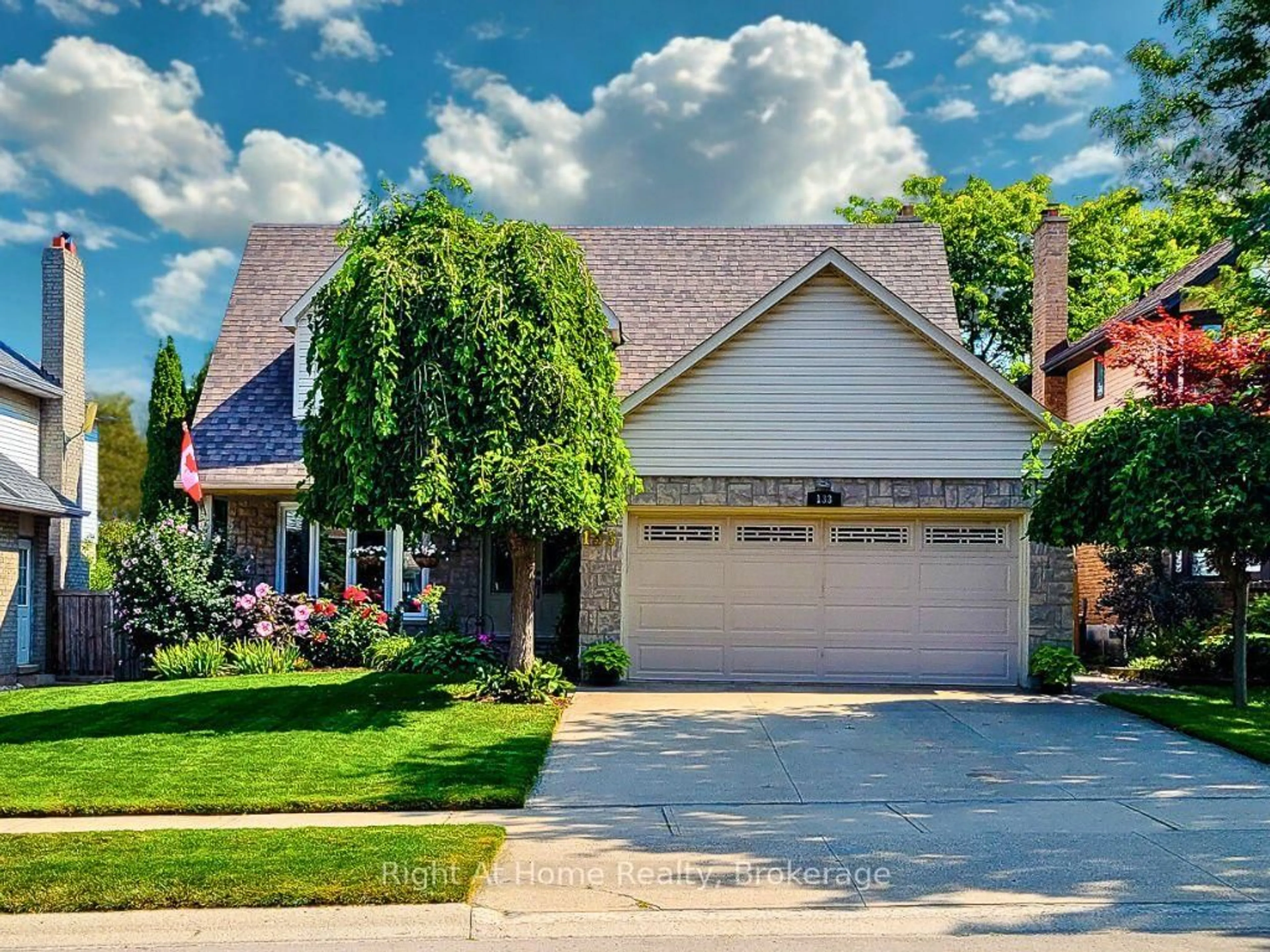 Home with brick exterior material, street for 133 Lavender Dr, Hamilton Ontario L9K 1B6