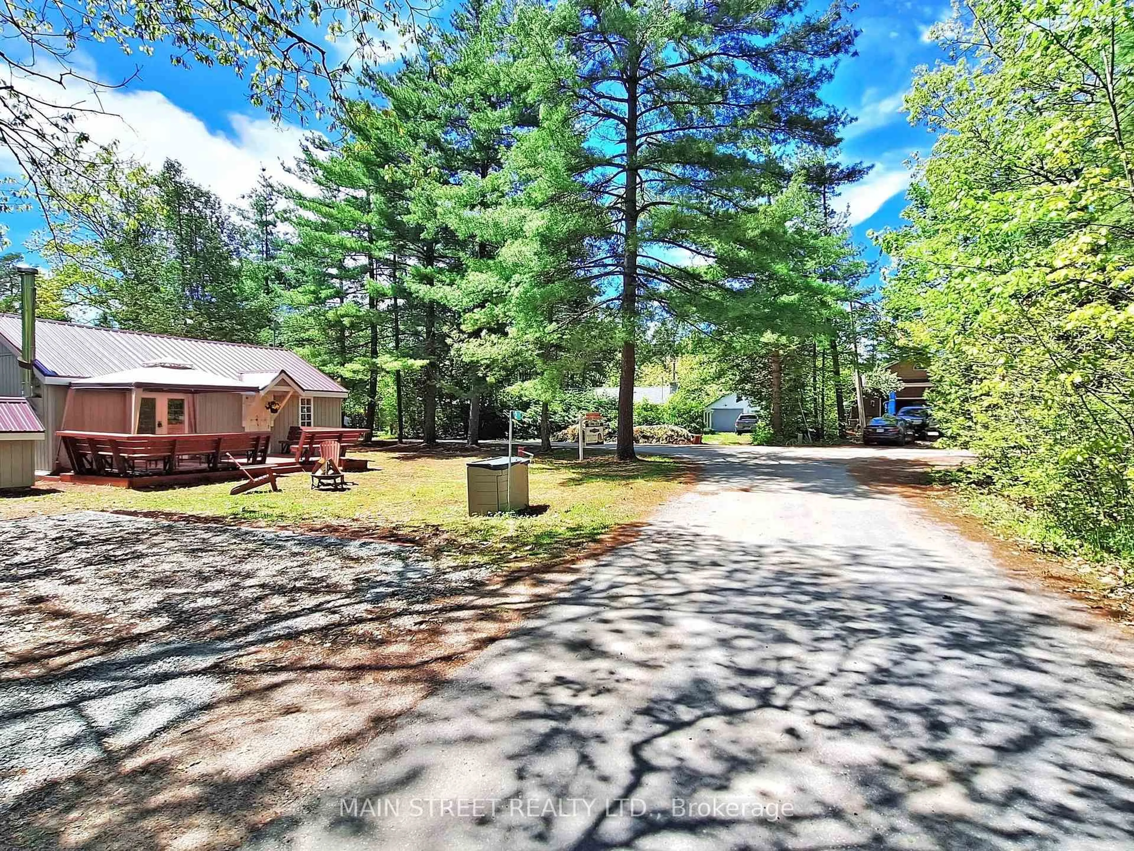 A pic from outside/outdoor area/front of a property/back of a property/a pic from drone, forest/trees view for 2 Cedarhurst Ave, Kawartha Lakes Ontario K0M 1N0