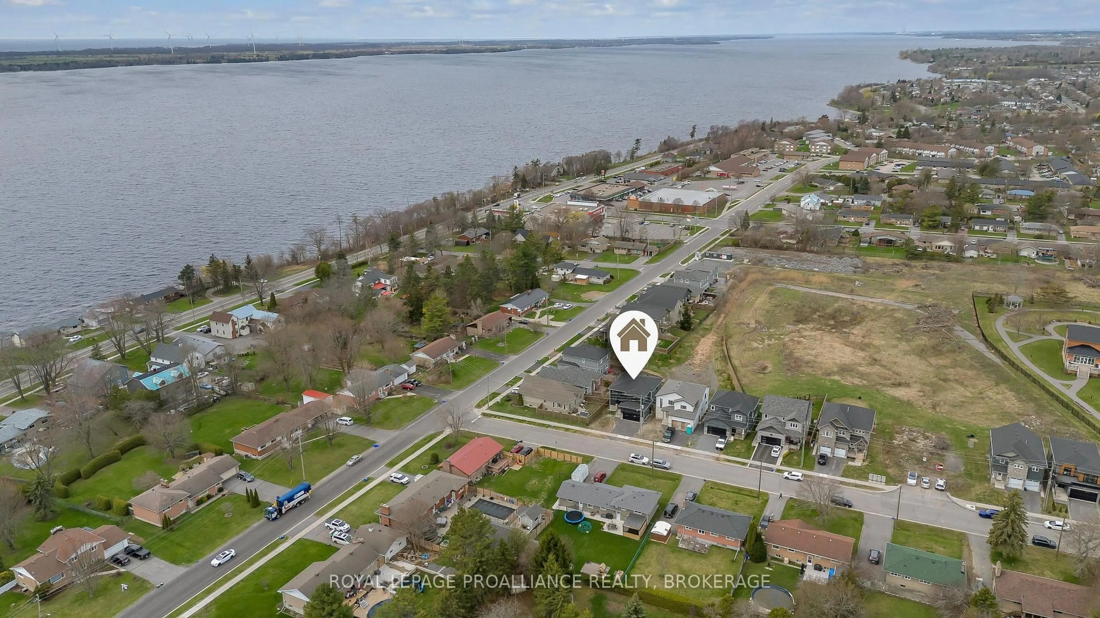 A pic from outside/outdoor area/front of a property/back of a property/a pic from drone, water/lake/river/ocean view for 2 Park Cres, Loyalist Ontario K7N 0C2