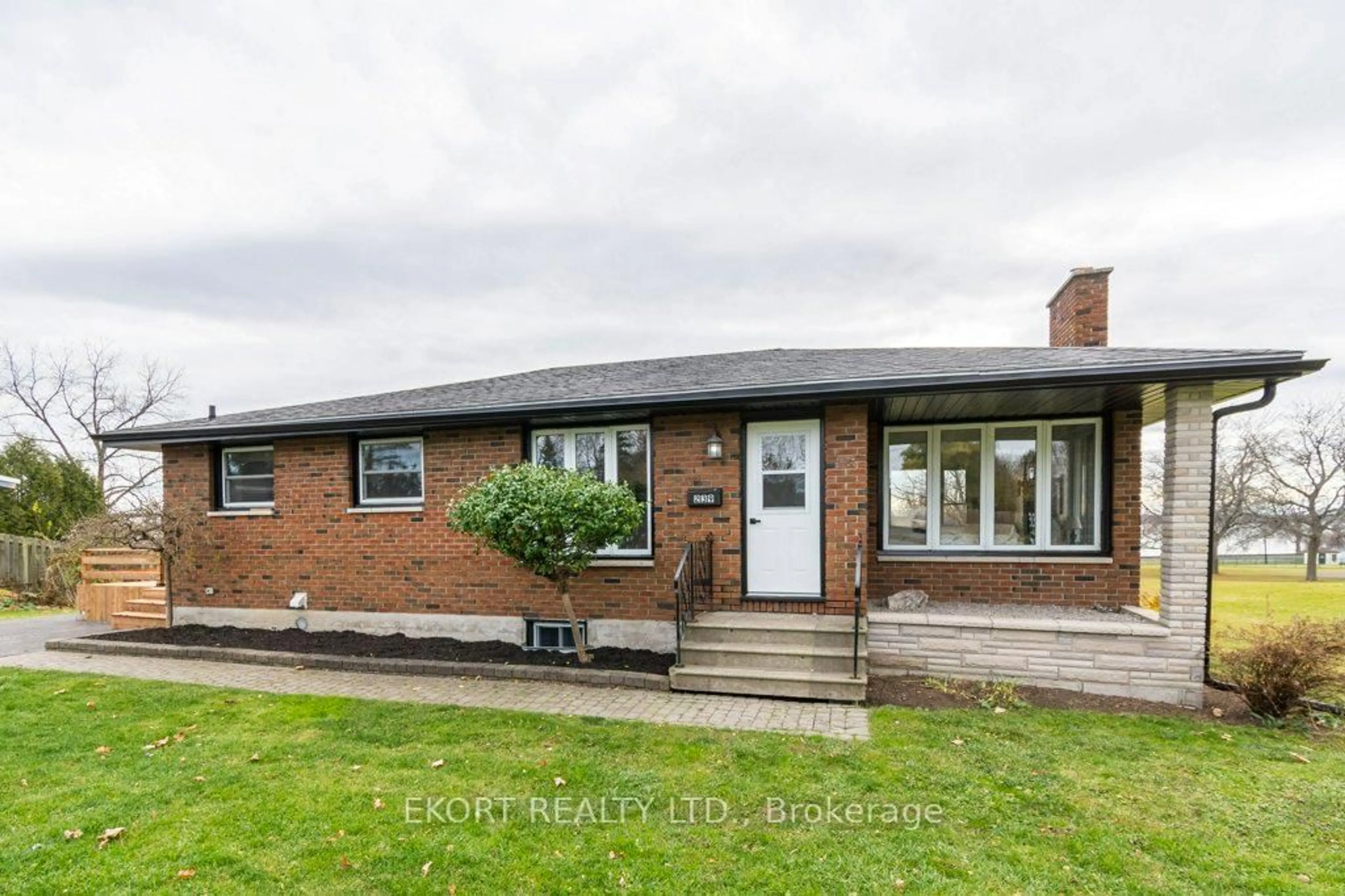 Home with brick exterior material, street for 239 Dundas St, Belleville Ontario K8P 1A9