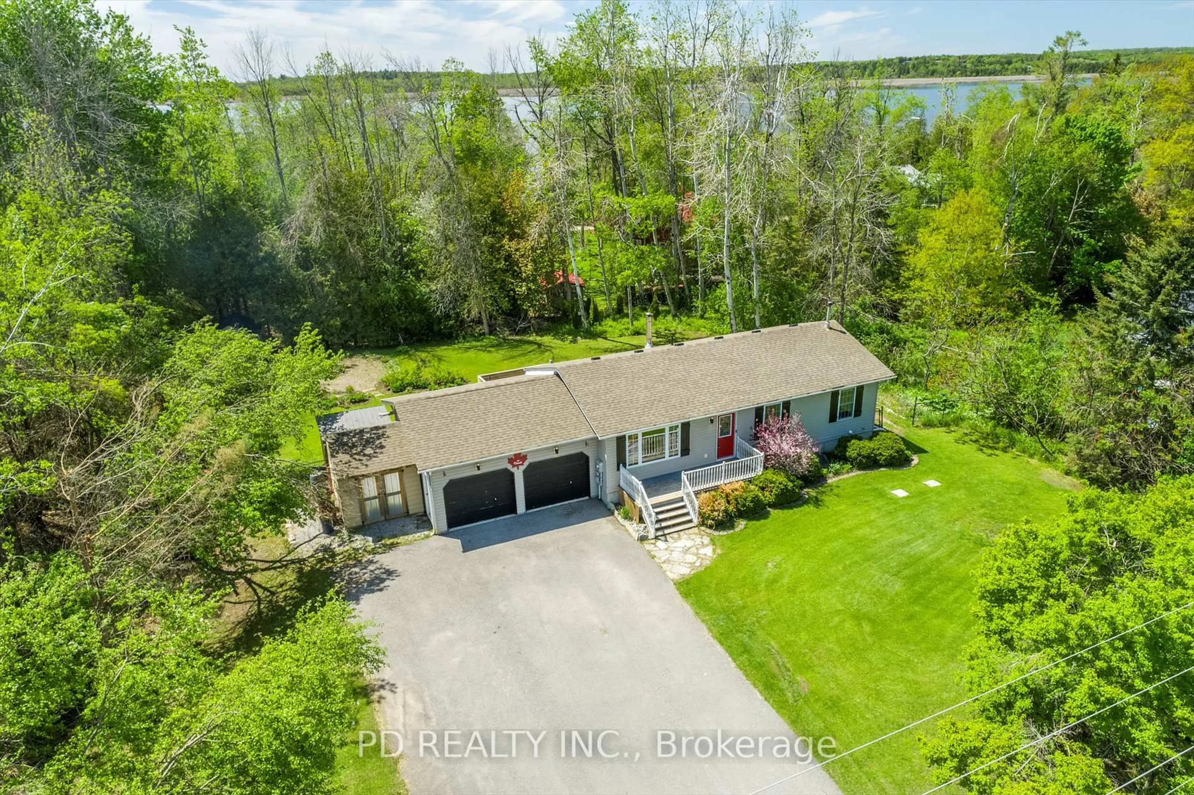 A pic from outside/outdoor area/front of a property/back of a property/a pic from drone, water/lake/river/ocean view for 3 Westview Dr, Kawartha Lakes Ontario K0L 2W0
