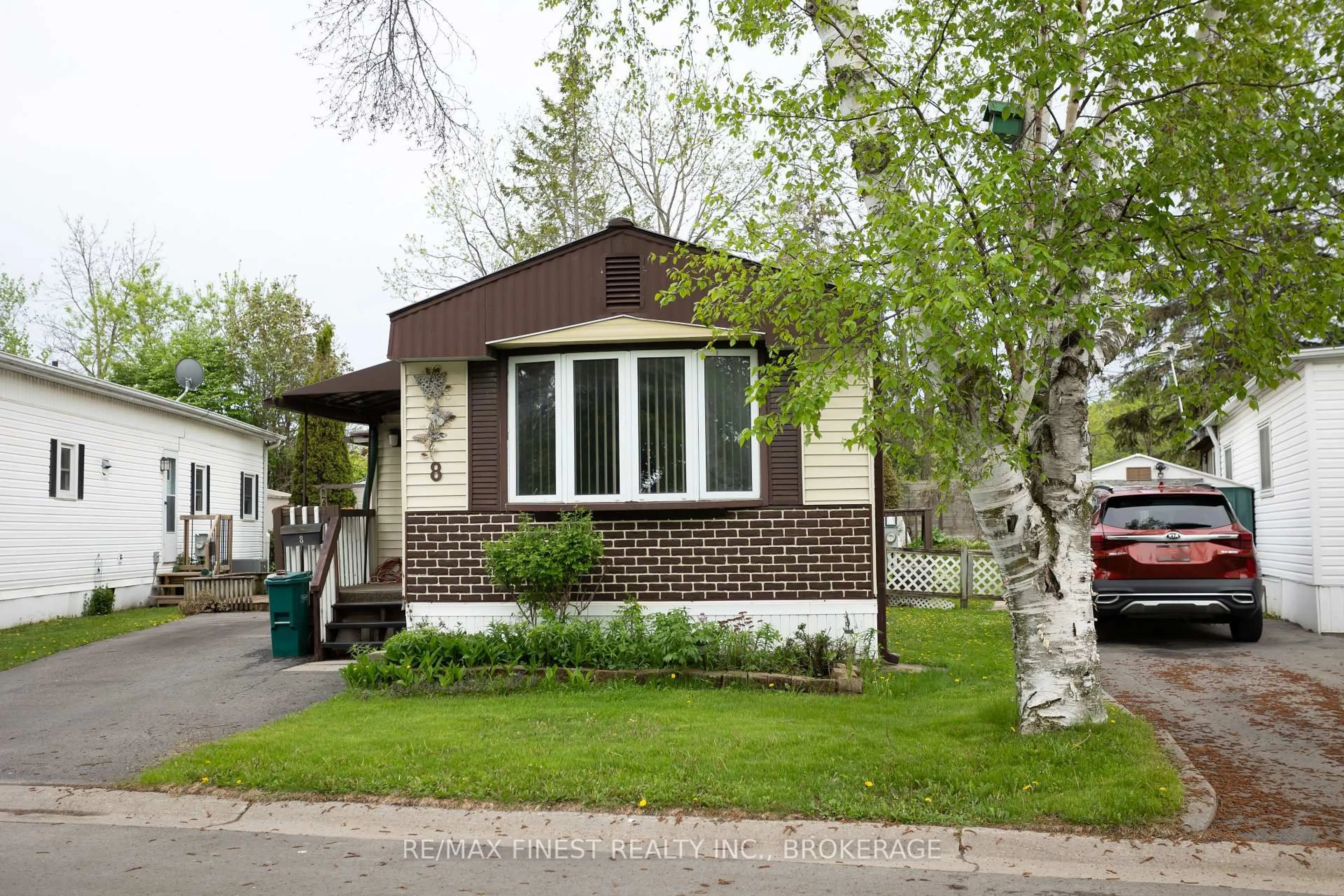 Home with vinyl exterior material, street for 8 Abbey Glen Dr, Kingston Ontario K7K 6A5