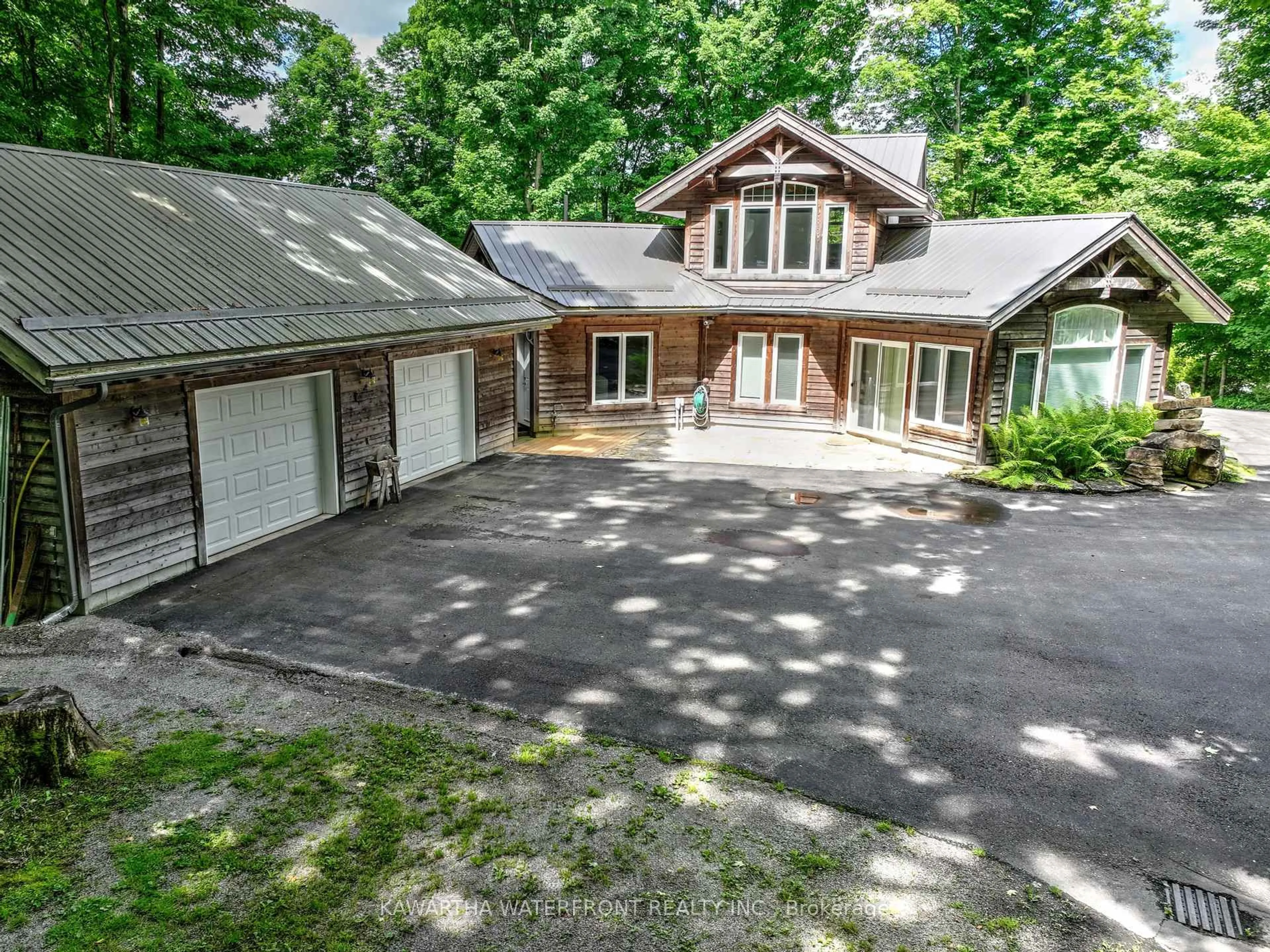 A pic from outside/outdoor area/front of a property/back of a property/a pic from drone, unknown for 284 Lake Dalrymple Rd, Kawartha Lakes Ontario L0K 1W0
