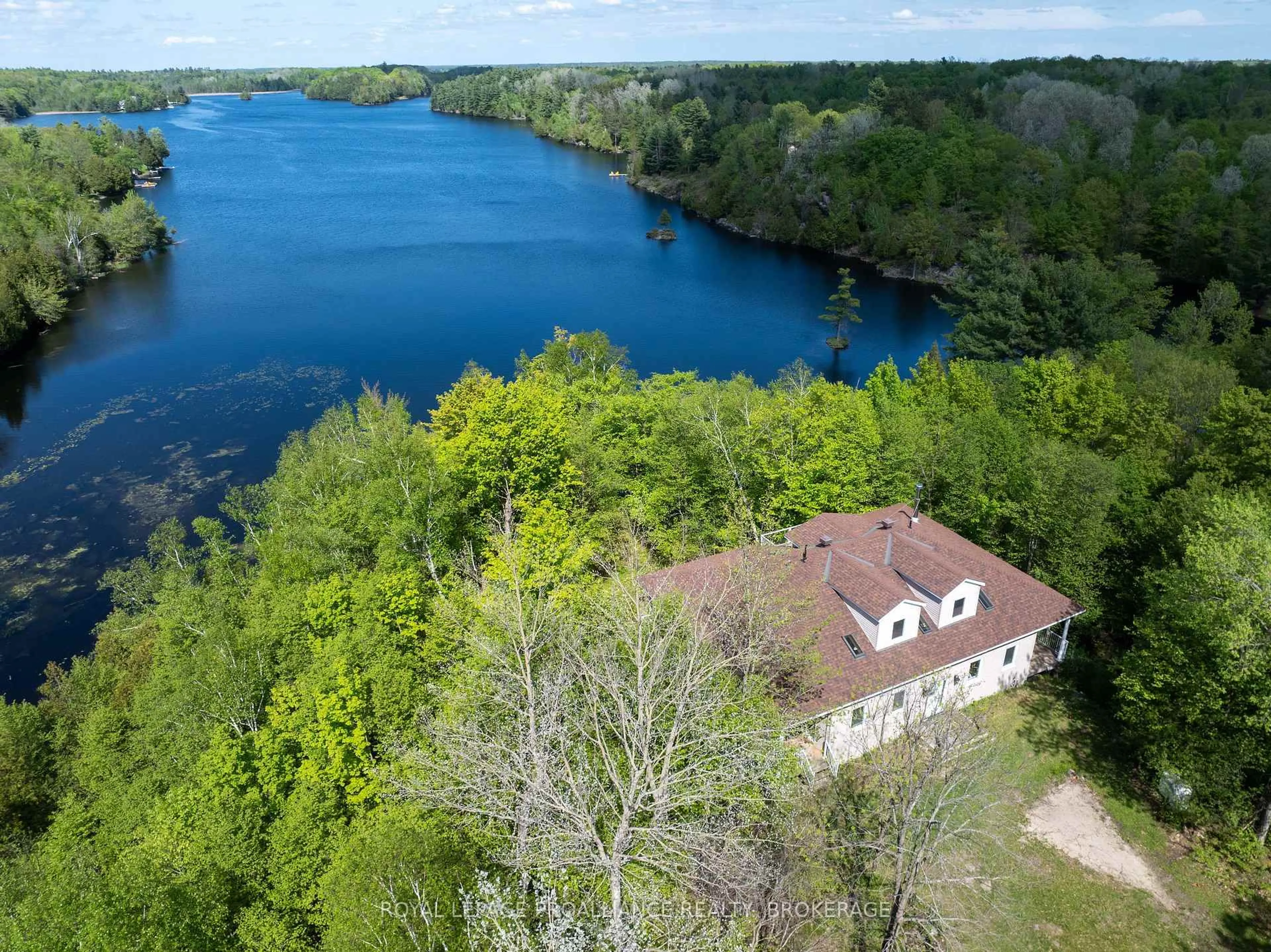 A pic from outside/outdoor area/front of a property/back of a property/a pic from drone, water/lake/river/ocean view for 124 Granite Hills, Perth Ontario K7H 3C7