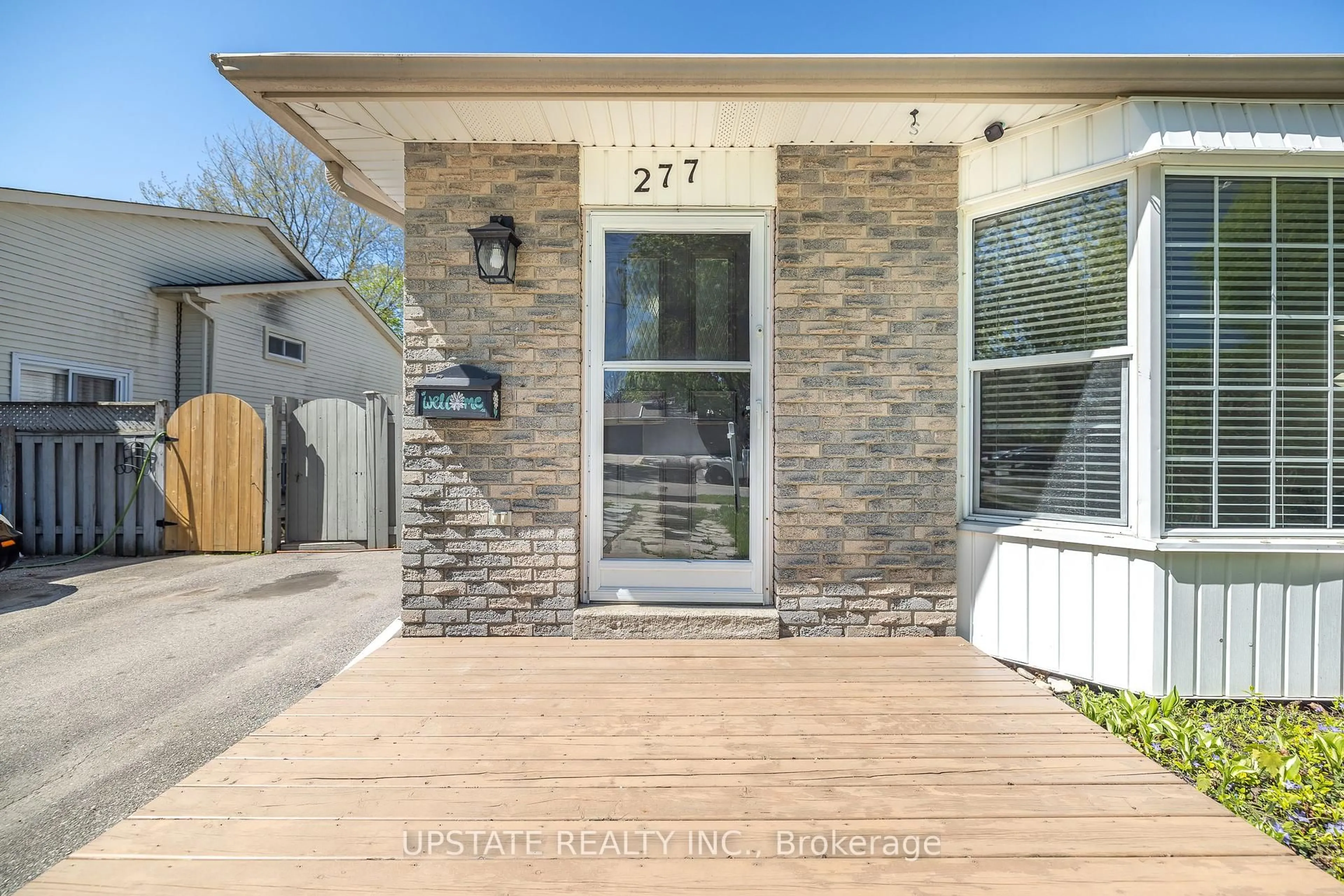 Home with brick exterior material, street for 277 Heritage Dr, Kitchener Ontario N2B 3A9