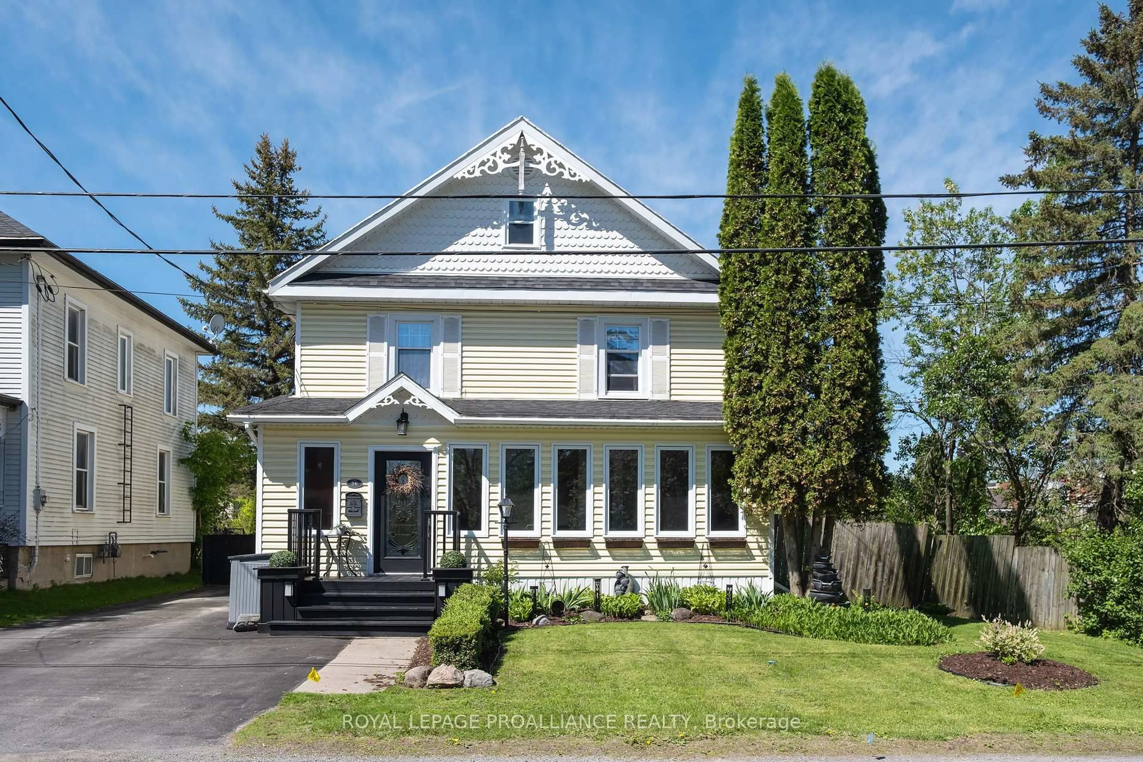 Home with vinyl exterior material, street for 36 John St, Stirling Ontario K0K 3E0