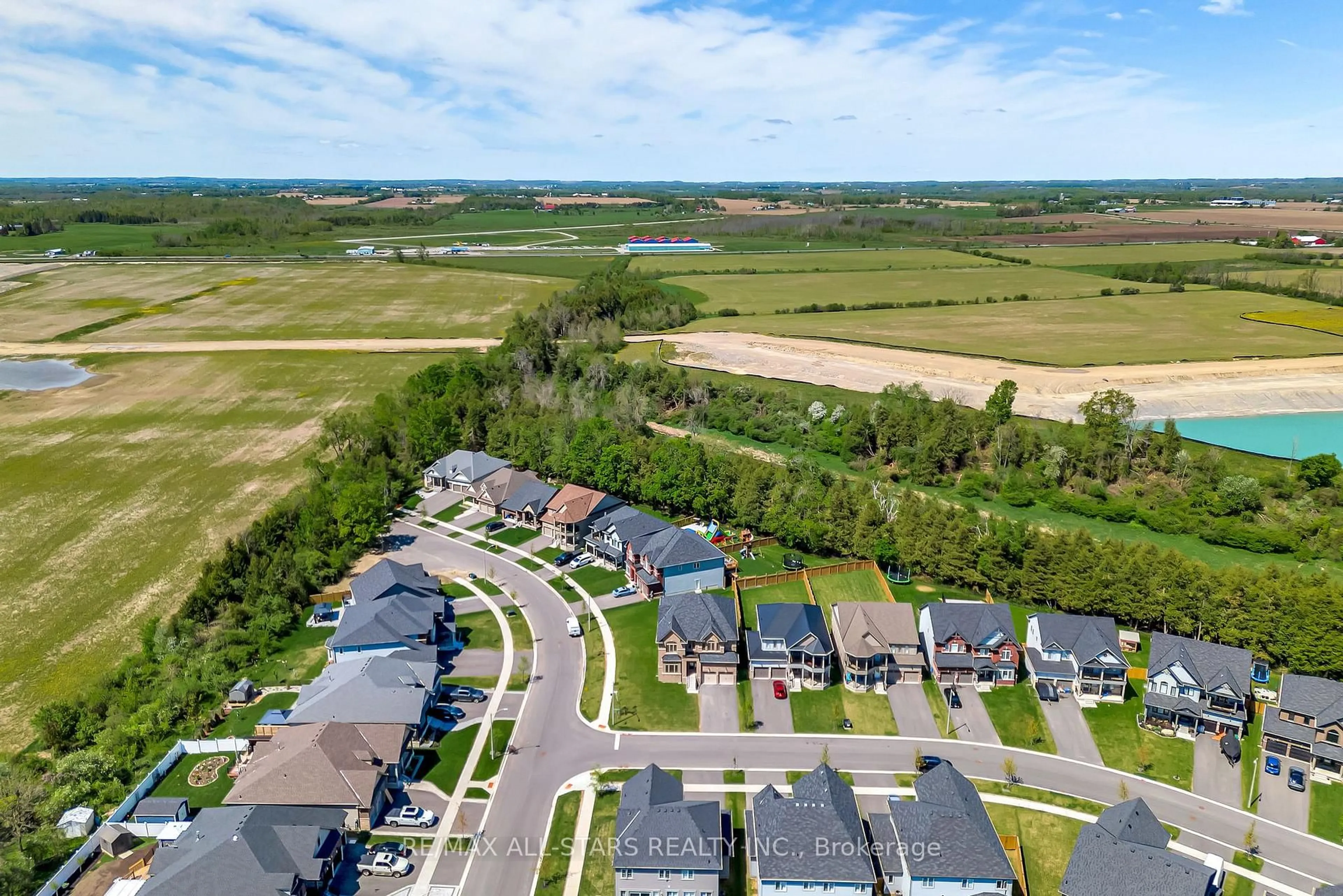 A pic from outside/outdoor area/front of a property/back of a property/a pic from drone, water/lake/river/ocean view for 92 Hennessey Cres, Kawartha Lakes Ontario K9V 1P4