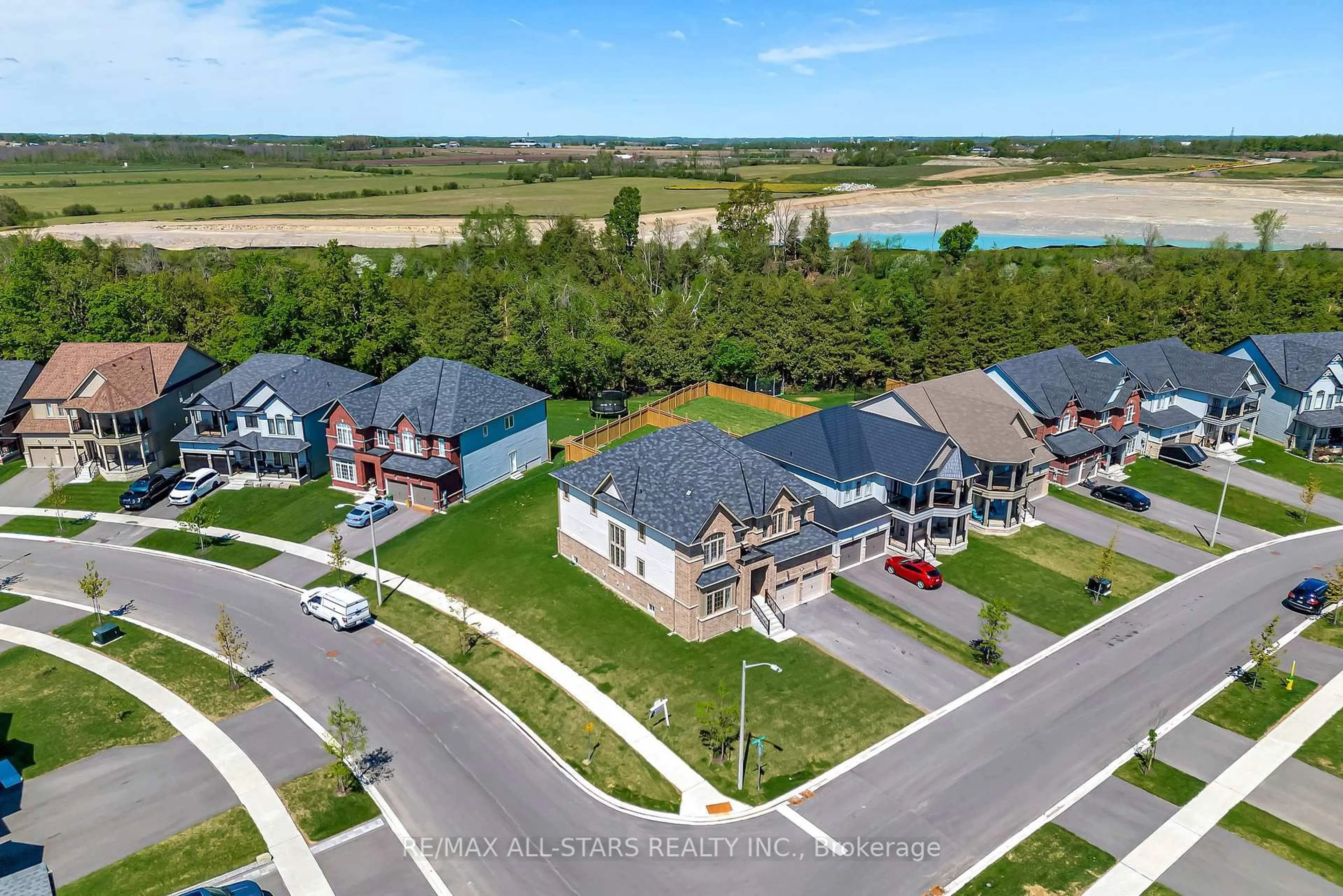 A pic from outside/outdoor area/front of a property/back of a property/a pic from drone, water/lake/river/ocean view for 92 Hennessey Cres, Kawartha Lakes Ontario K9V 1P4
