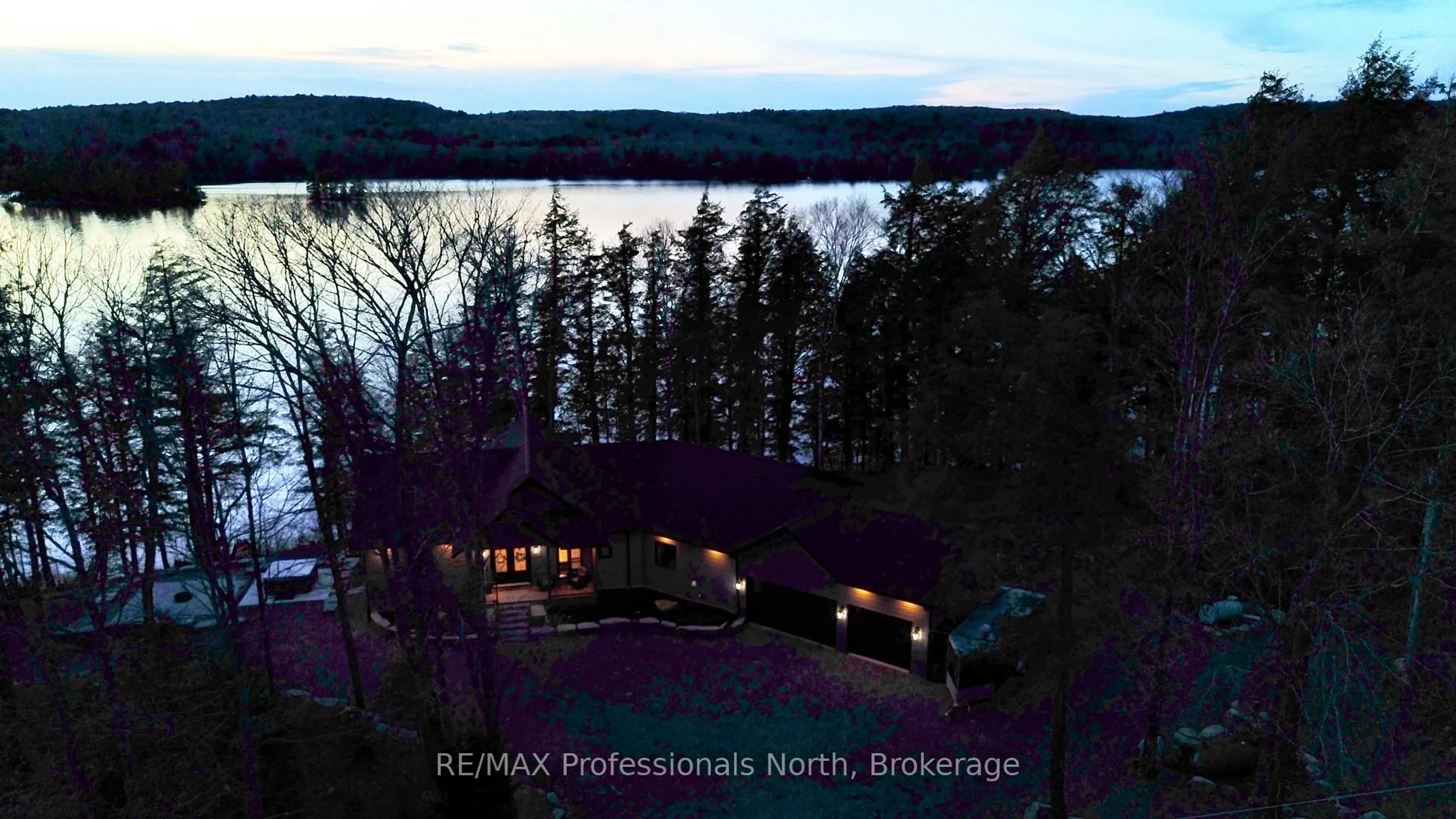 A pic from outside/outdoor area/front of a property/back of a property/a pic from drone, water/lake/river/ocean view for 1034 Lone Wolf Cres, Dysart et al Ontario K0M 1S0