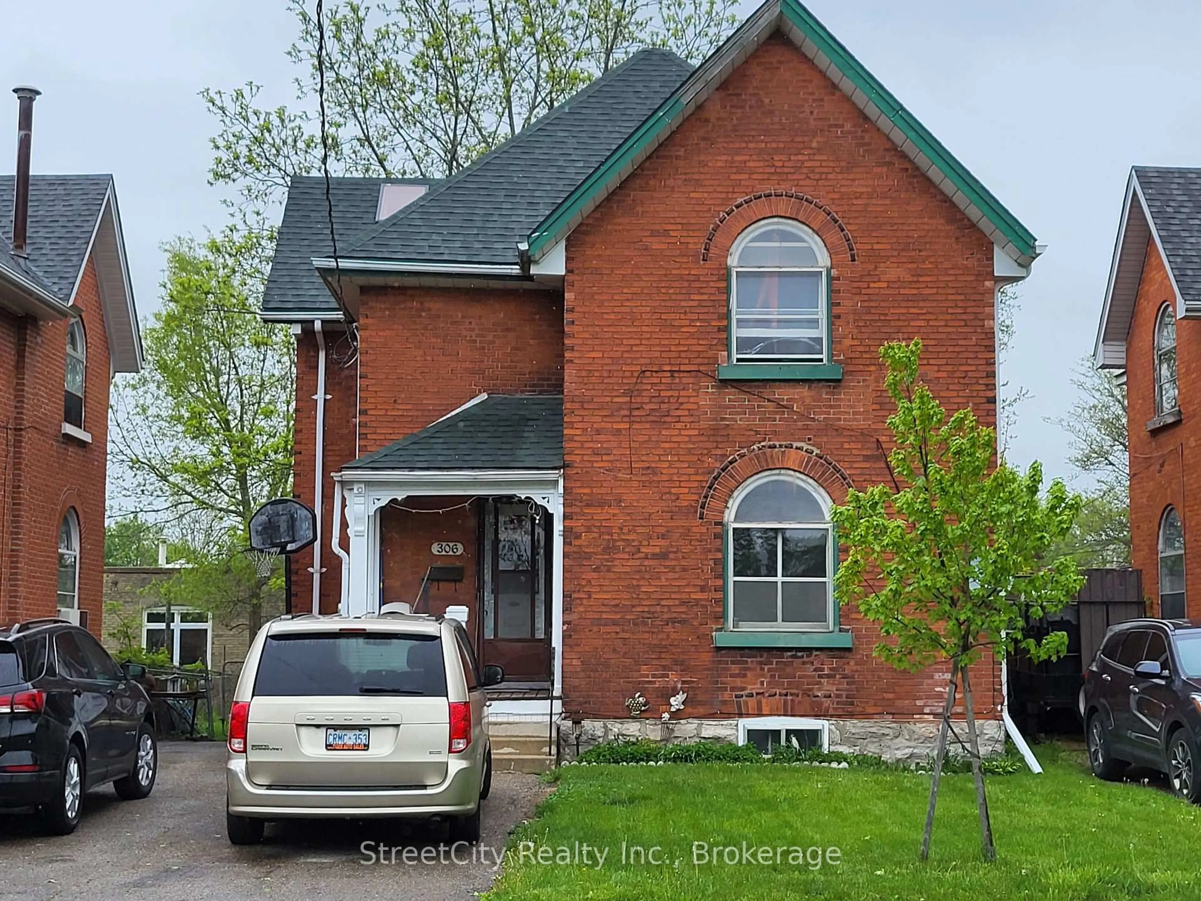 Home with brick exterior material, street for 306 Douro St, Stratford Ontario N5A 3S5