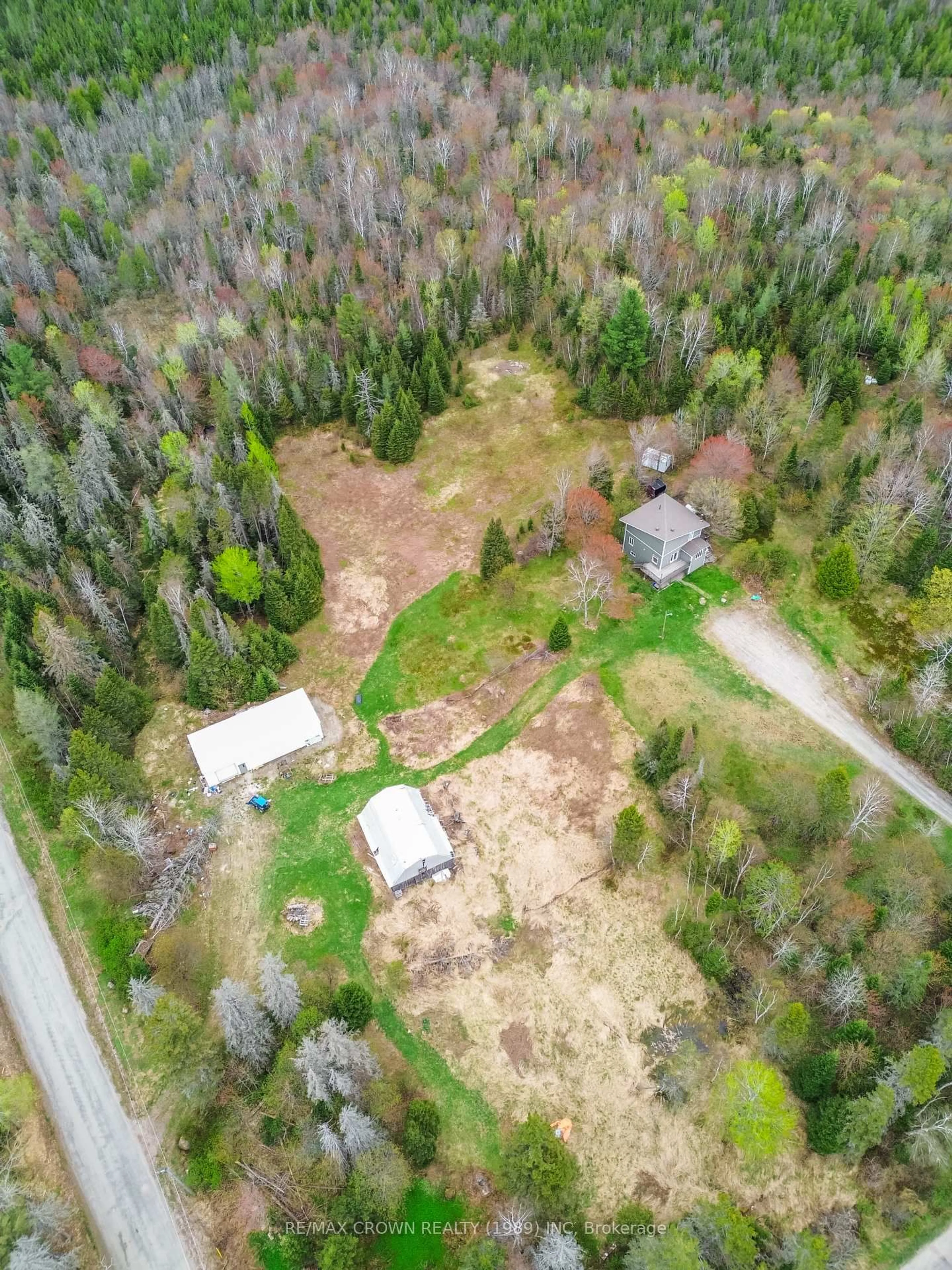 A pic from outside/outdoor area/front of a property/back of a property/a pic from drone, forest/trees view for 300 Widdifield Station Rd, North Bay Ontario P1B 8G2