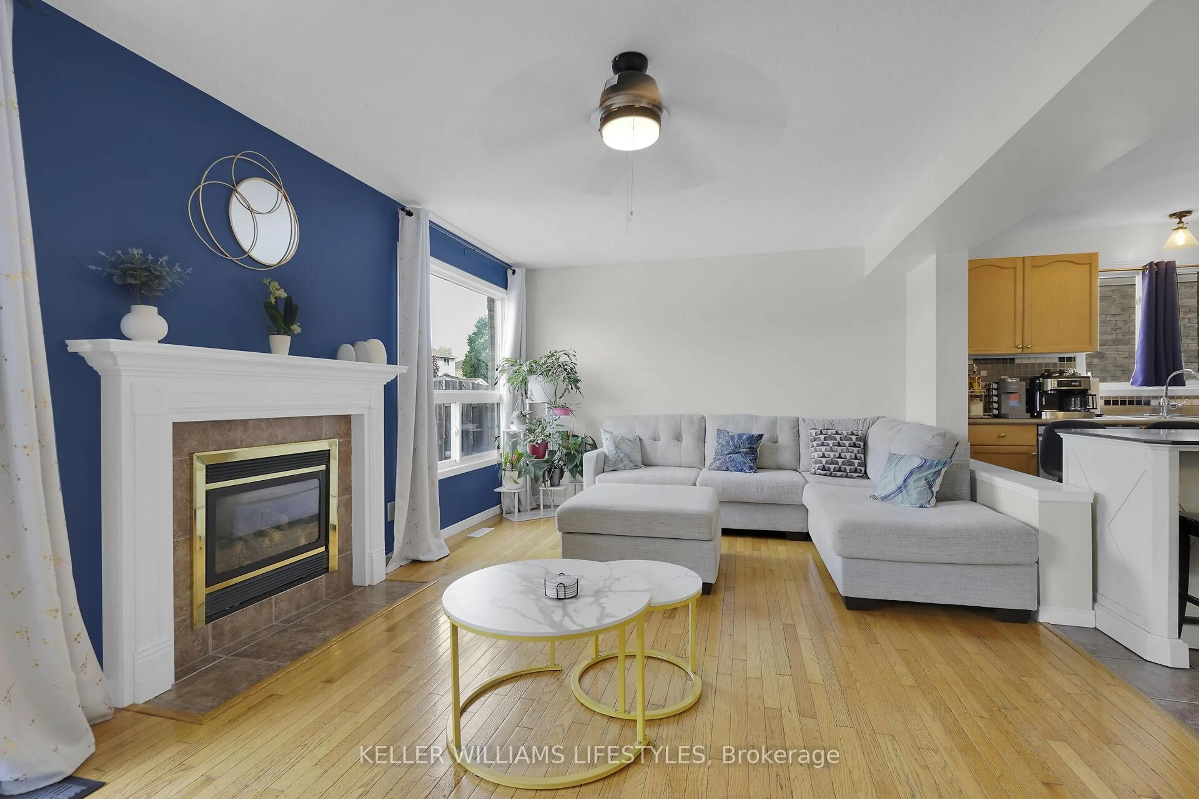 Living room with furniture, wood/laminate floor for 1226 Darnley Blvd, London South Ontario N6M 1L1