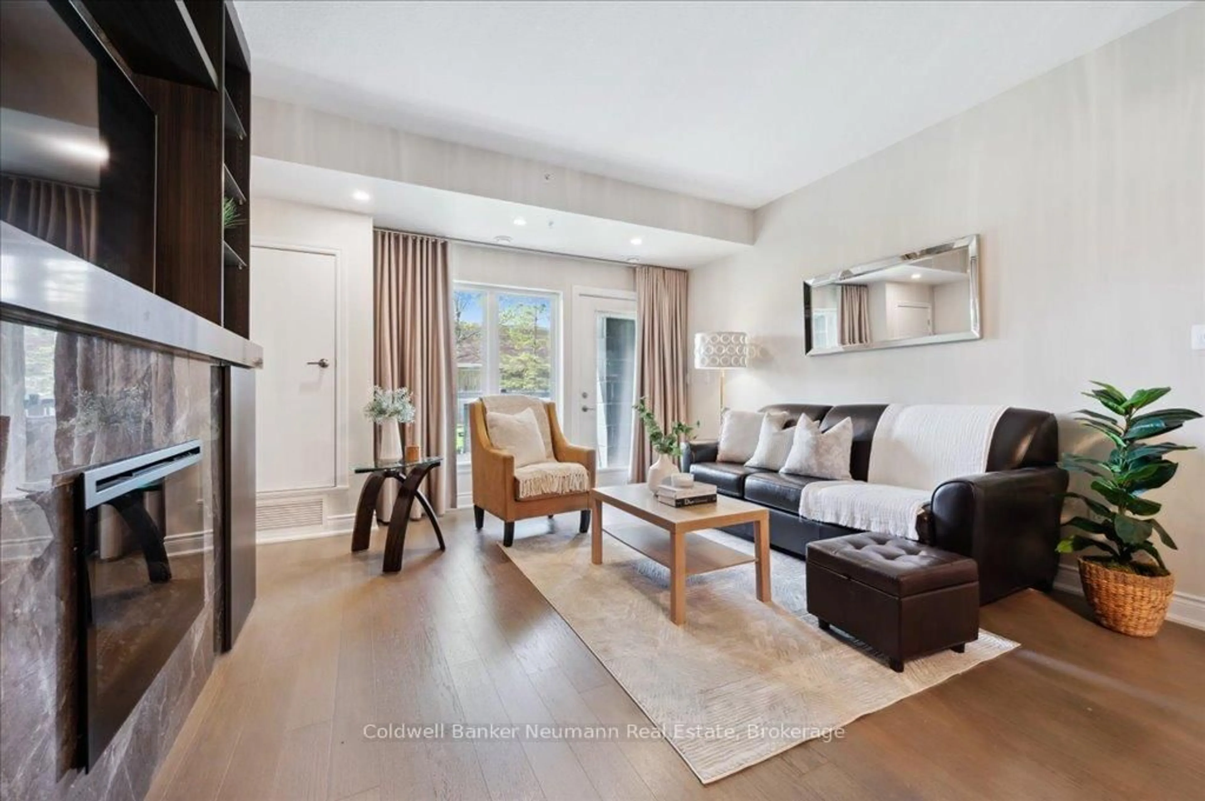 Living room with furniture, unknown for 106 Bard Blvd #102, Guelph Ontario N1L 0L8