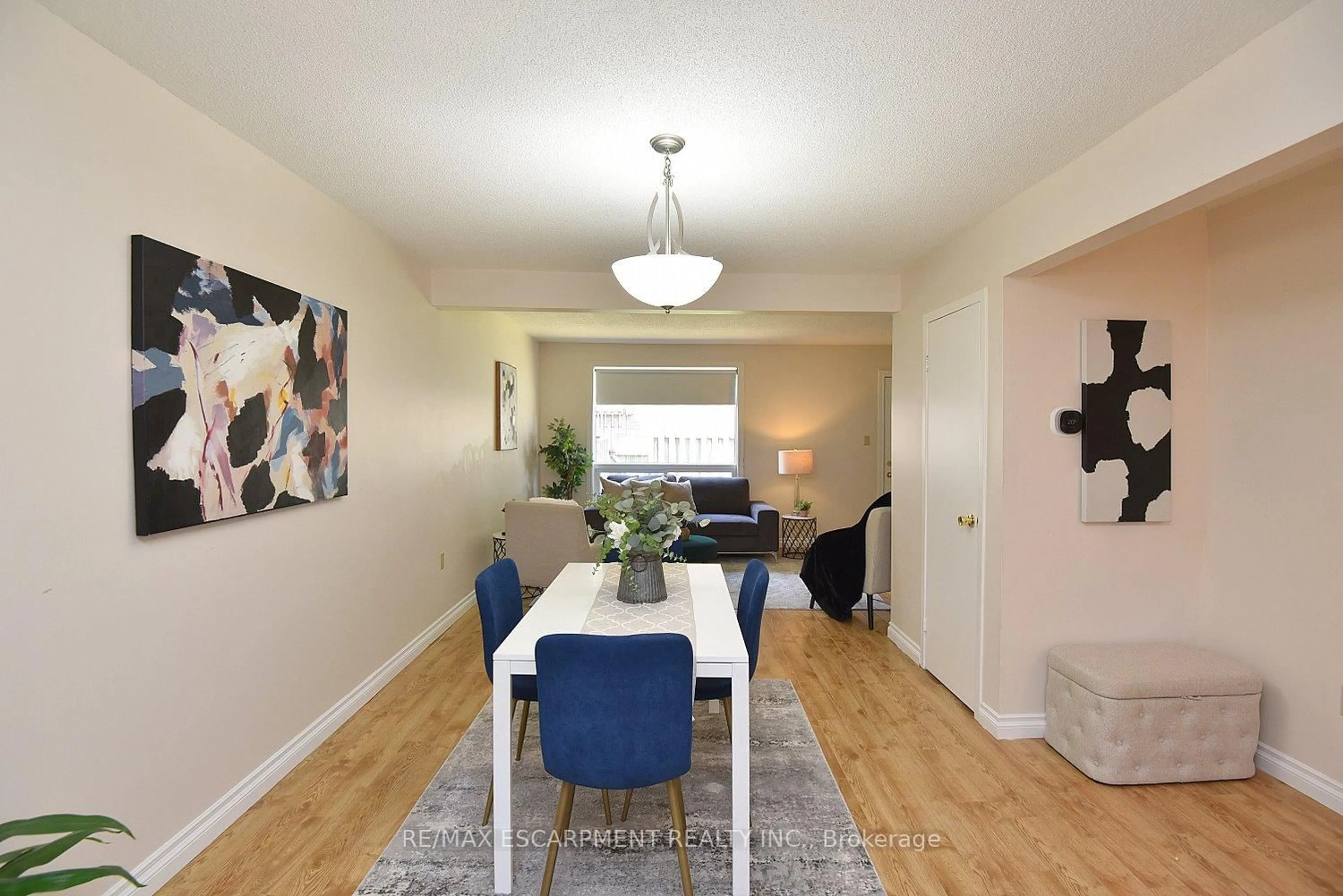 Dining room, wood/laminate floor for 250 Magnolia Dr #62, Hamilton Ontario L9C 6M3
