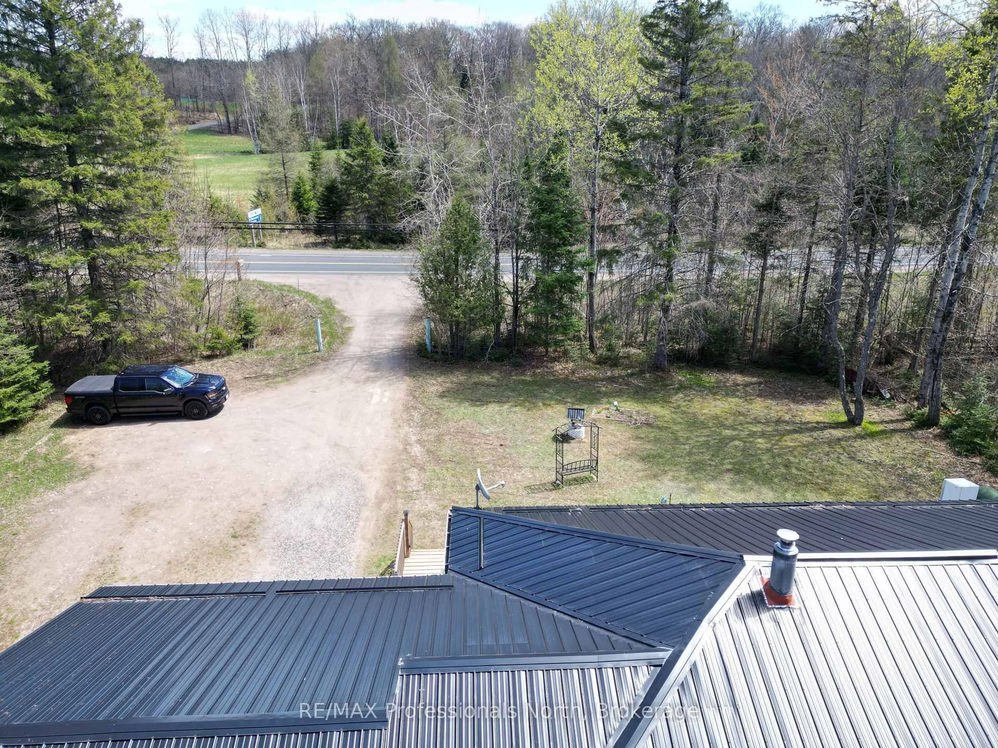 A pic from outside/outdoor area/front of a property/back of a property/a pic from drone, unknown for 2693 County Road 21 N/A, Minden Hills Ontario K0M 2K0