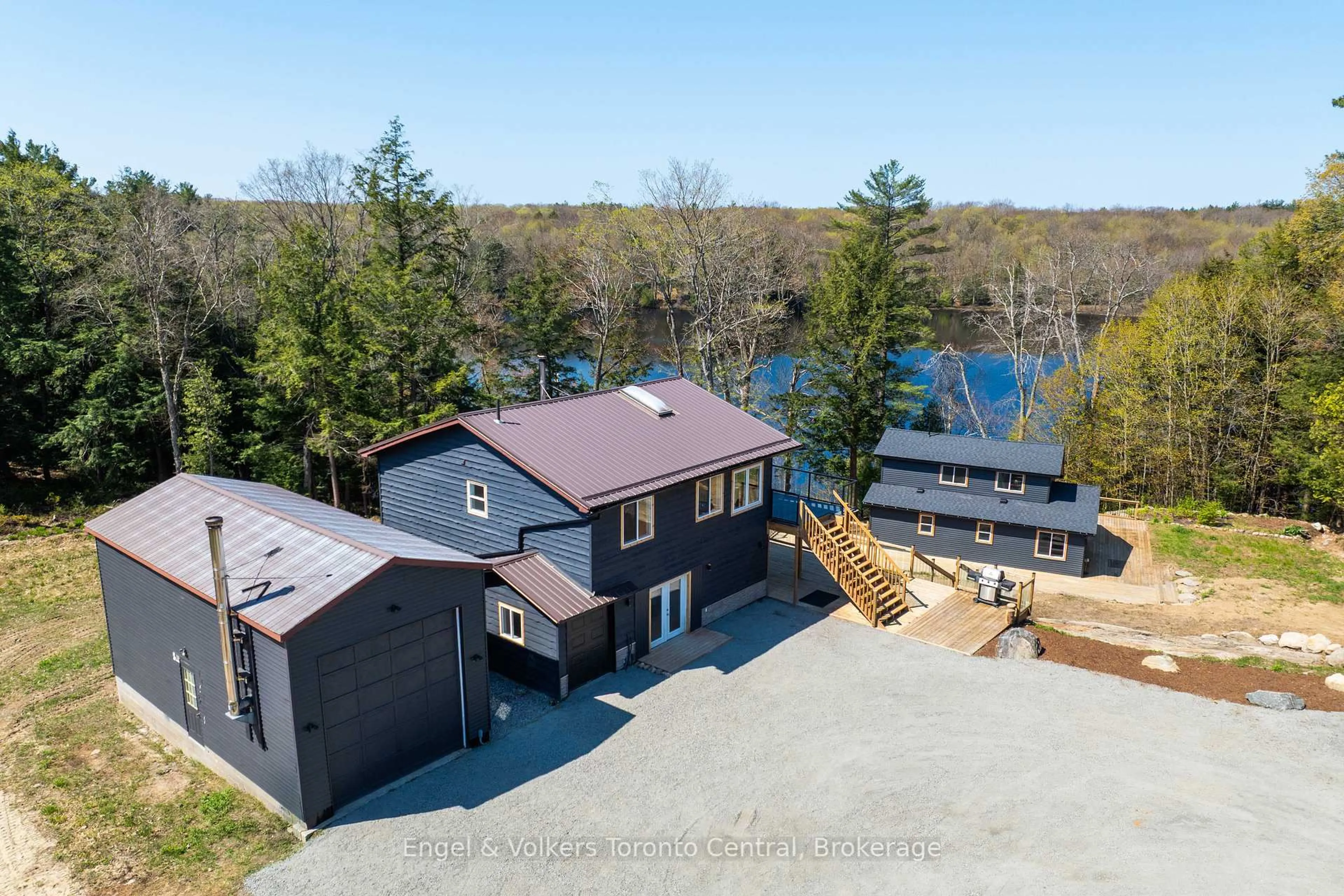 A pic from outside/outdoor area/front of a property/back of a property/a pic from drone, water/lake/river/ocean view for 1457 Lake Joseph Rd, Seguin Ontario P2A 2W8