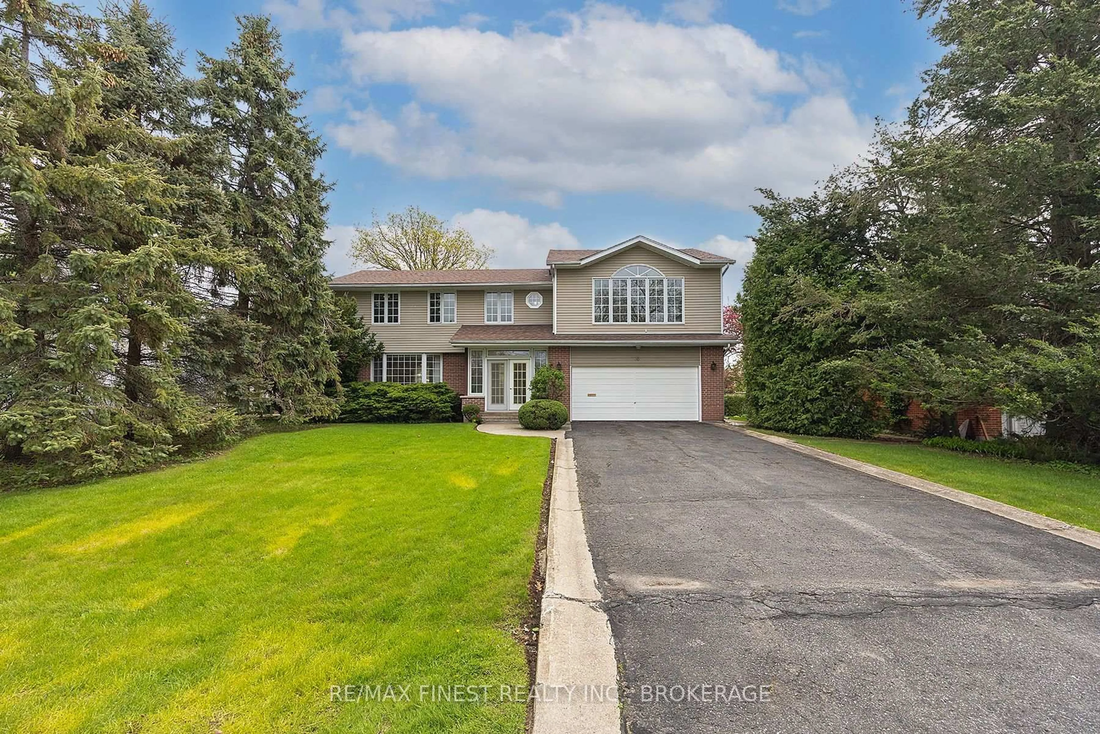A pic from outside/outdoor area/front of a property/back of a property/a pic from drone, street for 38 Lakeland Point Dr, Kingston Ontario K7M 4E7