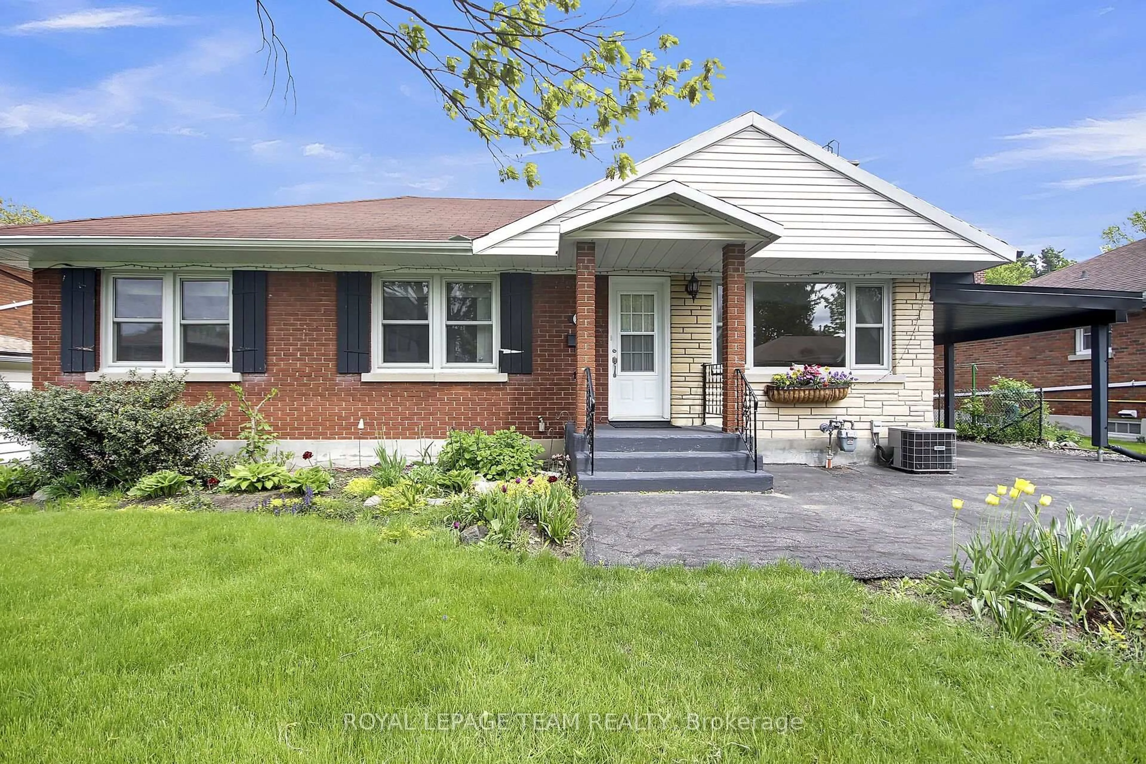 Home with brick exterior material, street for 1007 Bakervale Dr, Ottawa Ontario K1Z 6N7