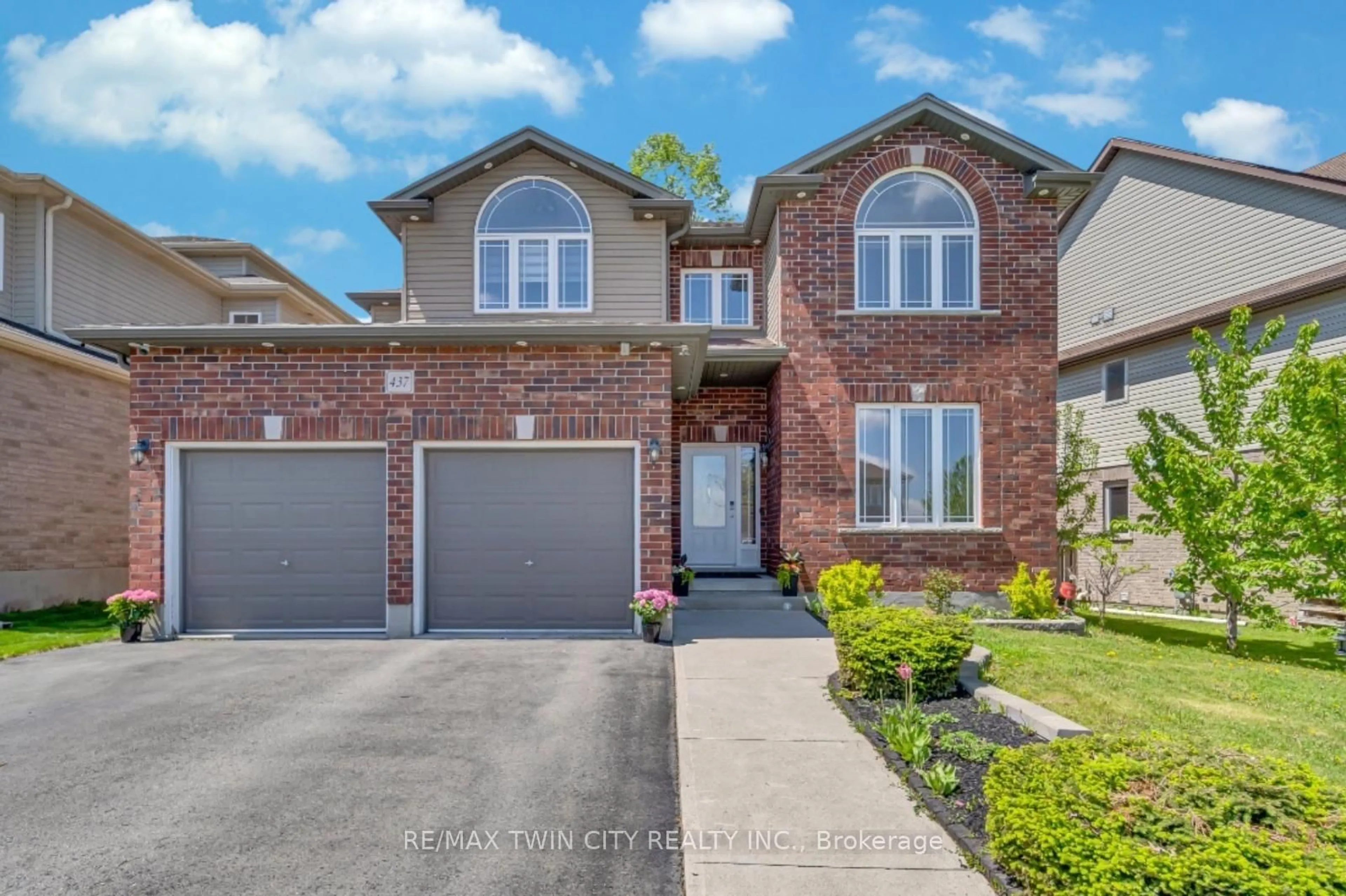 Home with brick exterior material, street for 437 Zeller Dr, Kitchener Ontario N2A 4M4