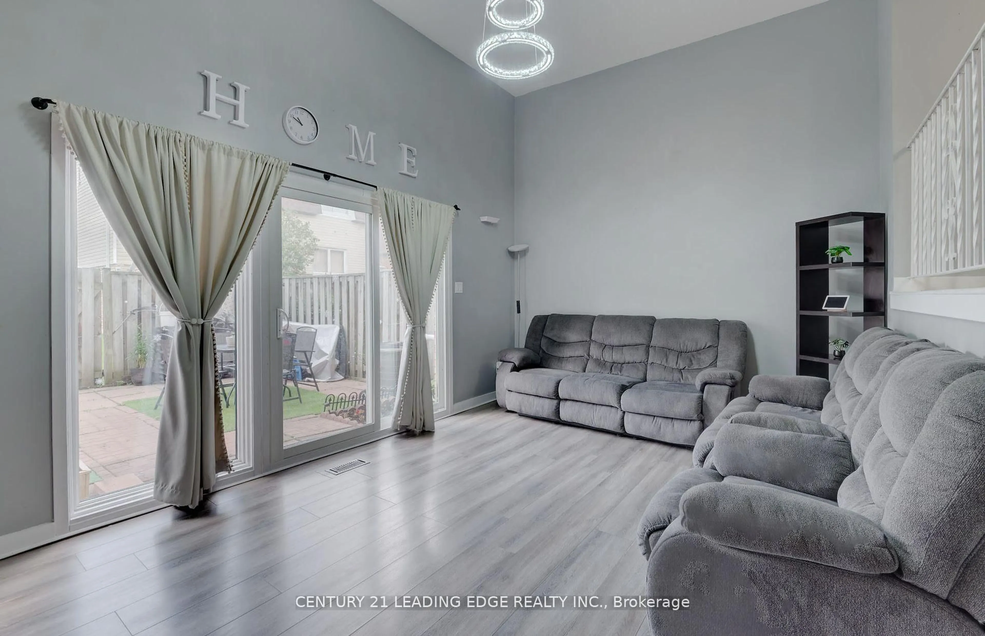 Living room with furniture, unknown for 11 Harrisford St #107, Hamilton Ontario L8K 6L7