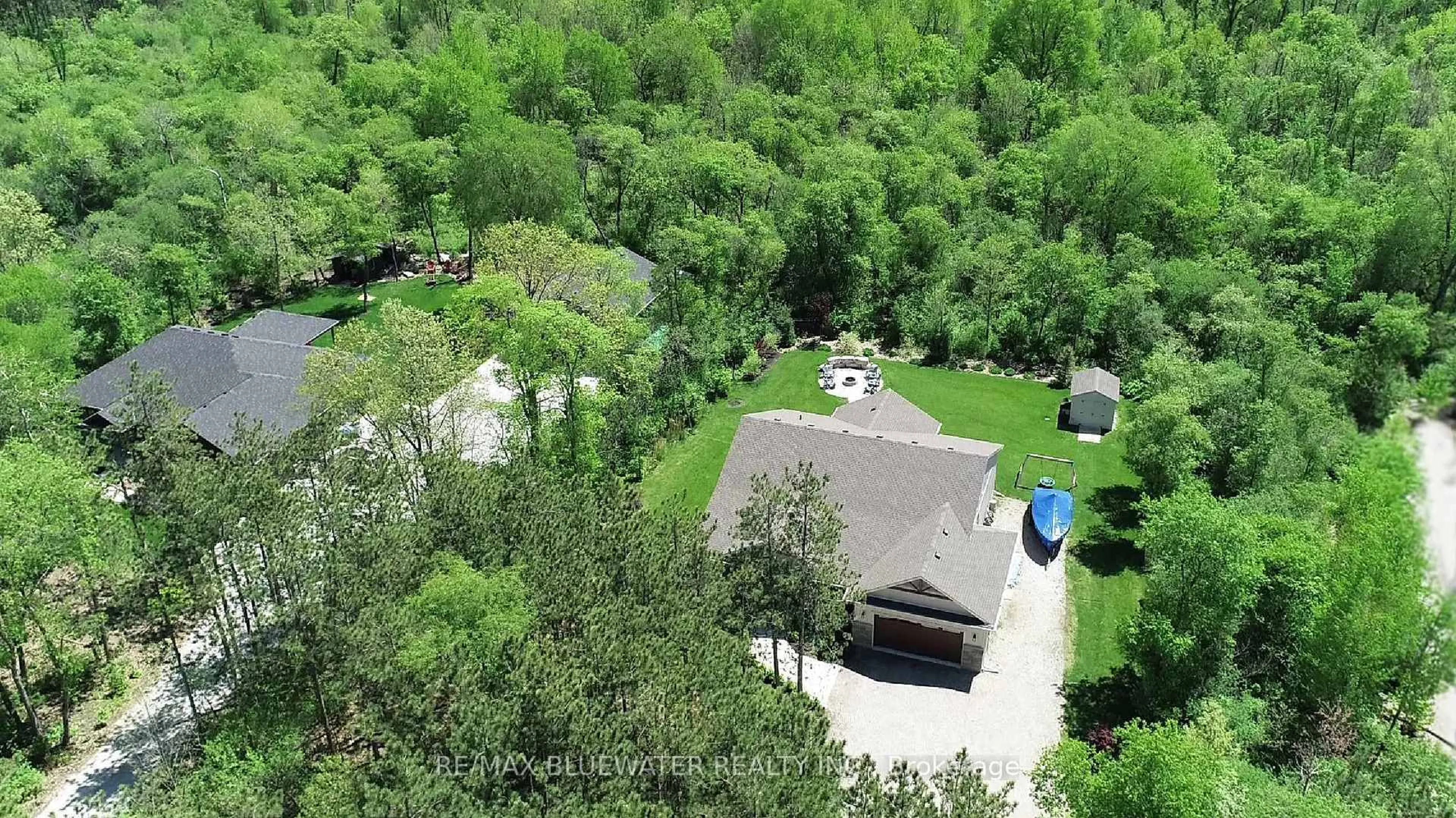 A pic from outside/outdoor area/front of a property/back of a property/a pic from drone, forest/trees view for 8437 Goosemarsh Line, Lambton Shores Ontario N0M 1T0