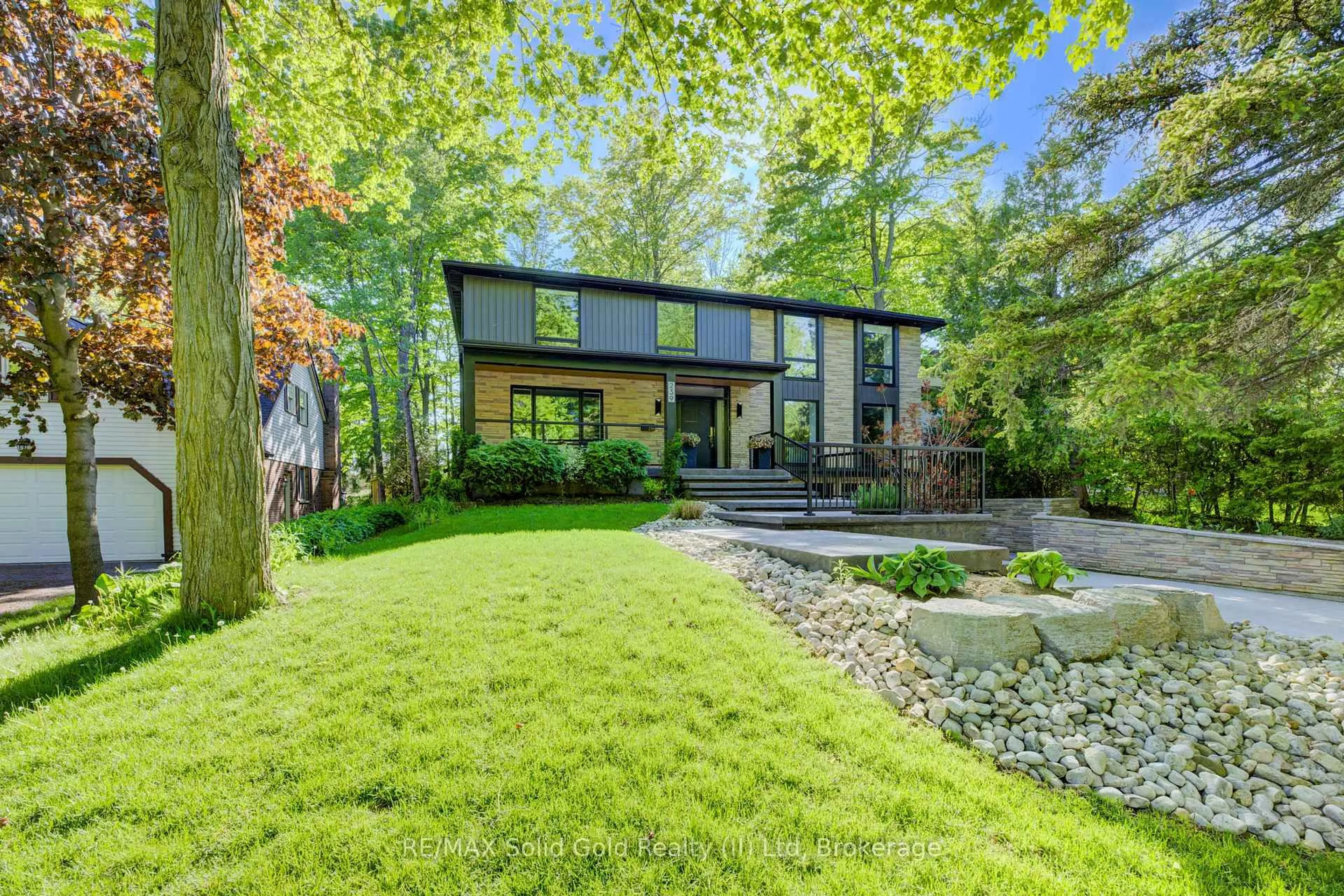 Home with brick exterior material, street for 239 Corrie Cres, Waterloo Ontario N2L 5W3