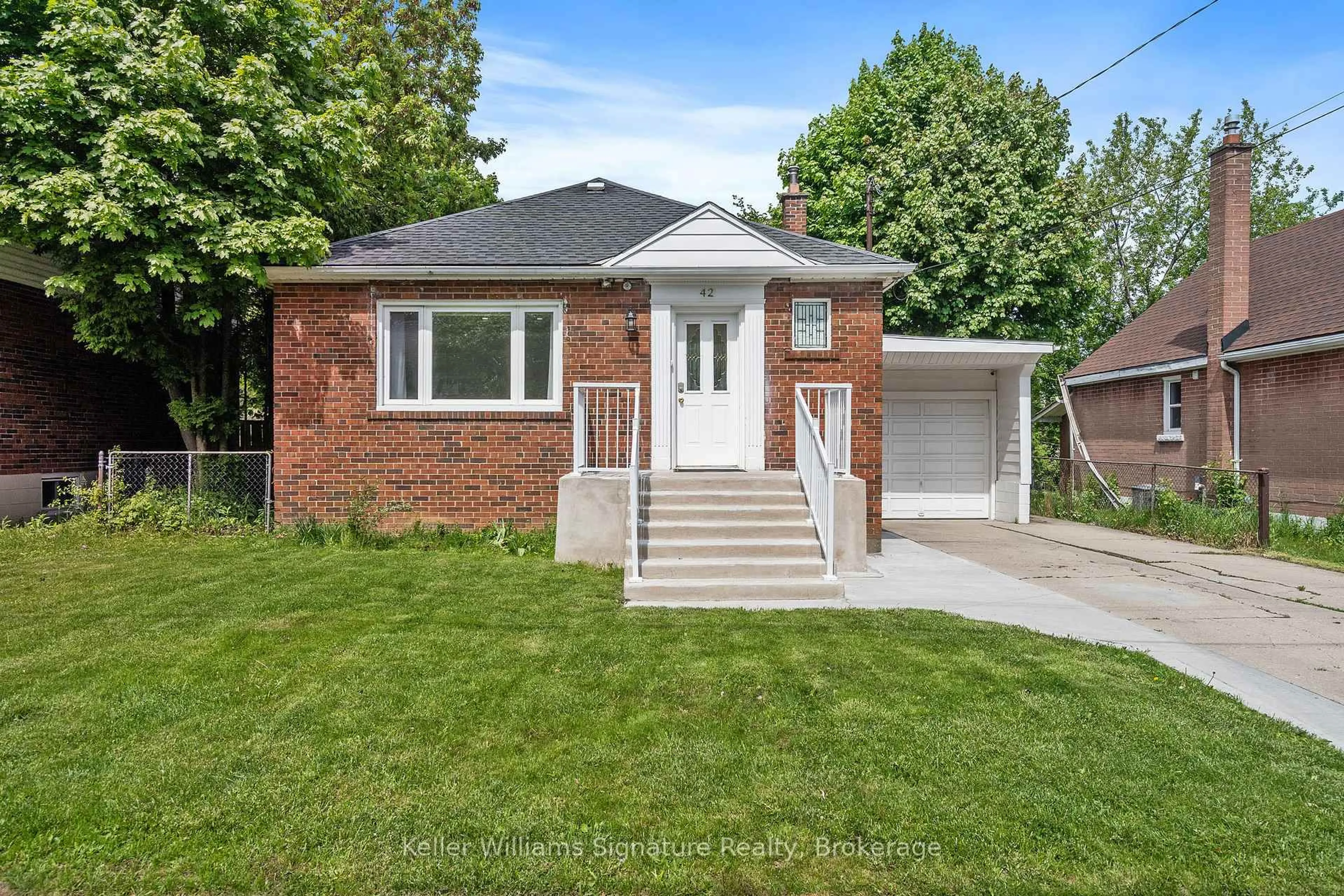 Home with brick exterior material, street for 42 West 4th St, Hamilton Ontario L9C 3M4