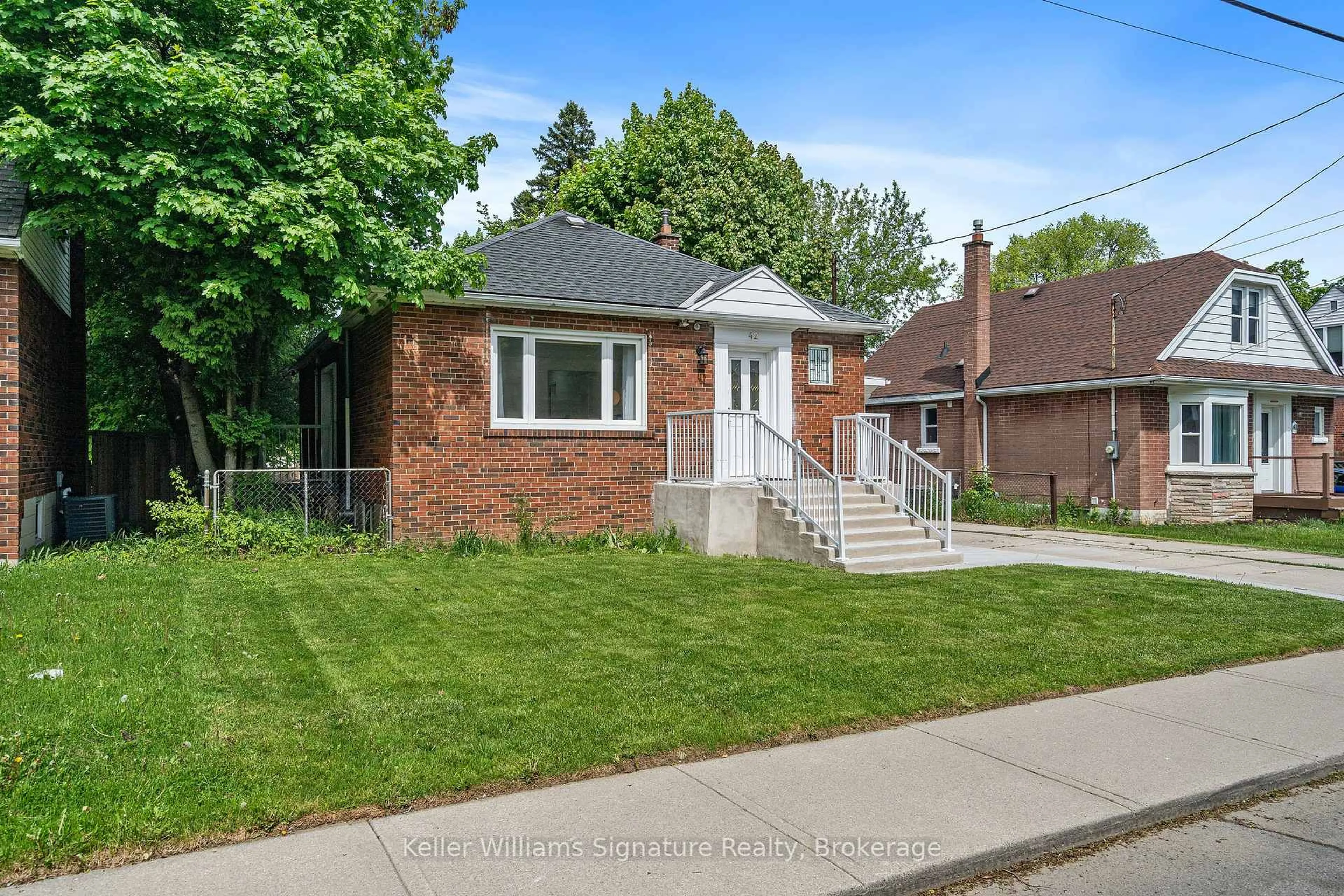 Home with brick exterior material, street for 42 West 4th St, Hamilton Ontario L9C 3M4