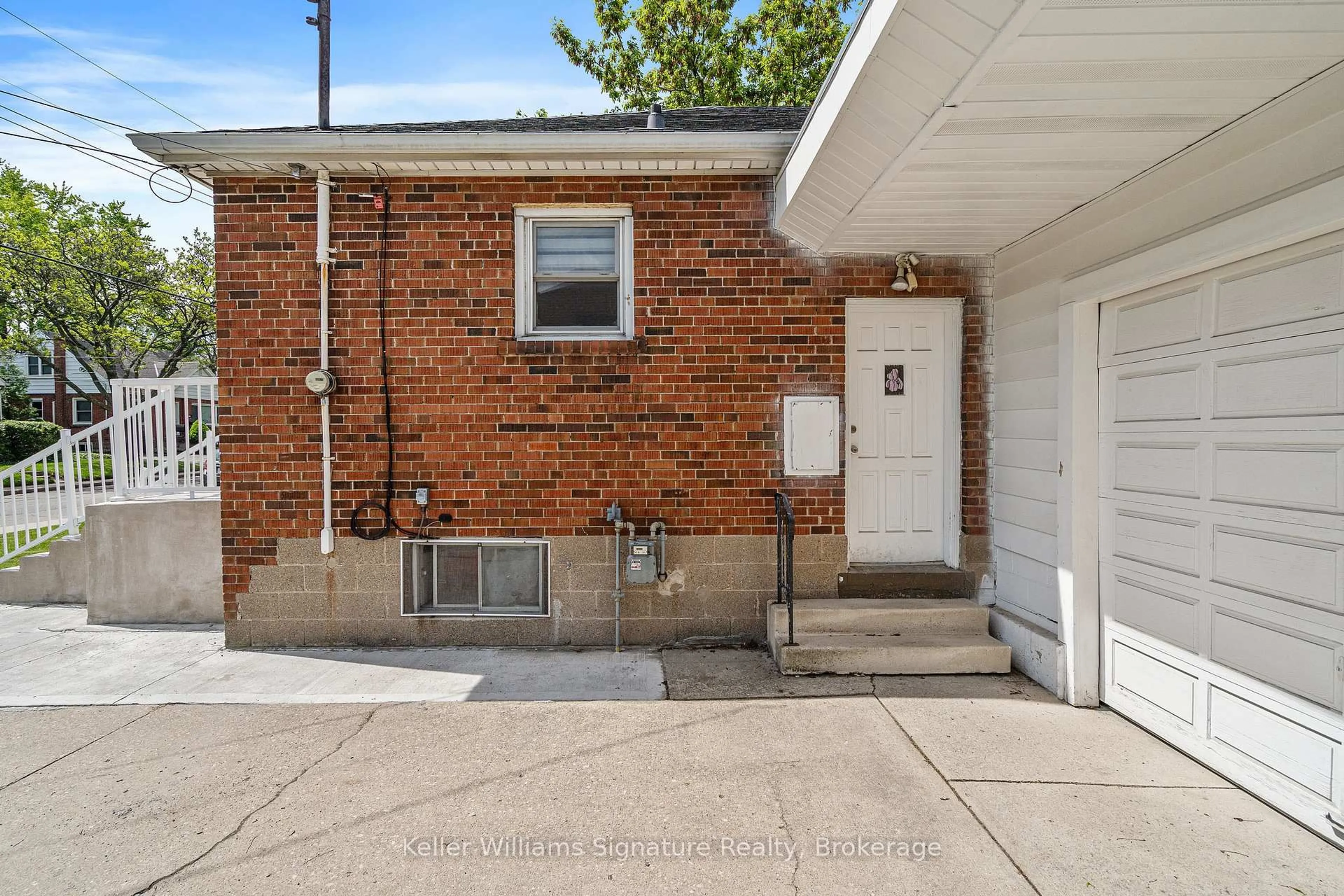 Home with brick exterior material, street for 42 West 4th St, Hamilton Ontario L9C 3M4