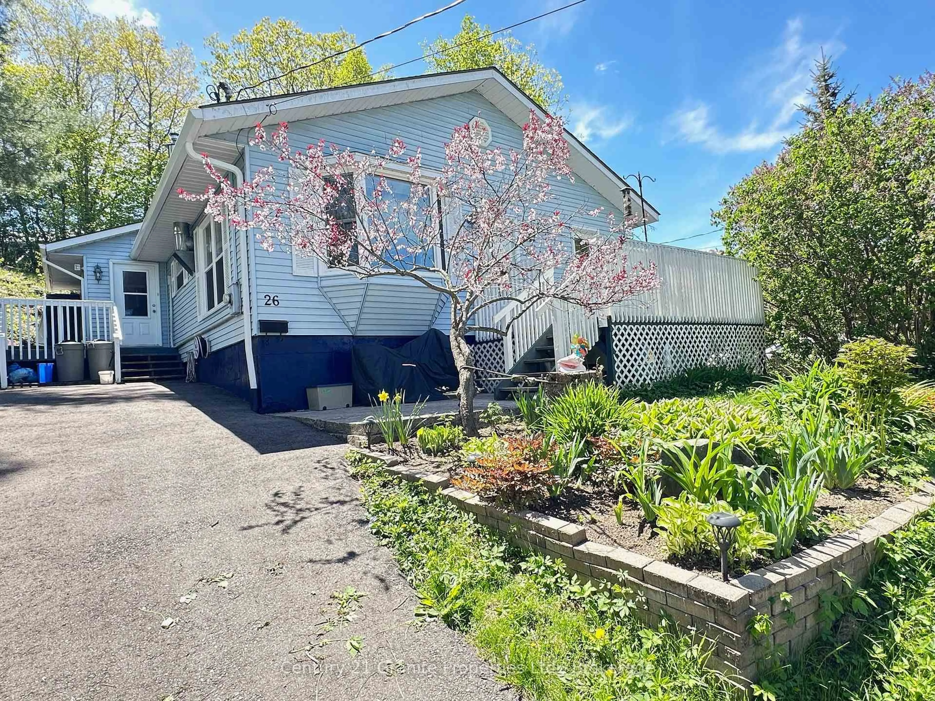 A pic from outside/outdoor area/front of a property/back of a property/a pic from drone, street for 26 Riverdale Rd, Parry Sound Ontario P2A 1N9