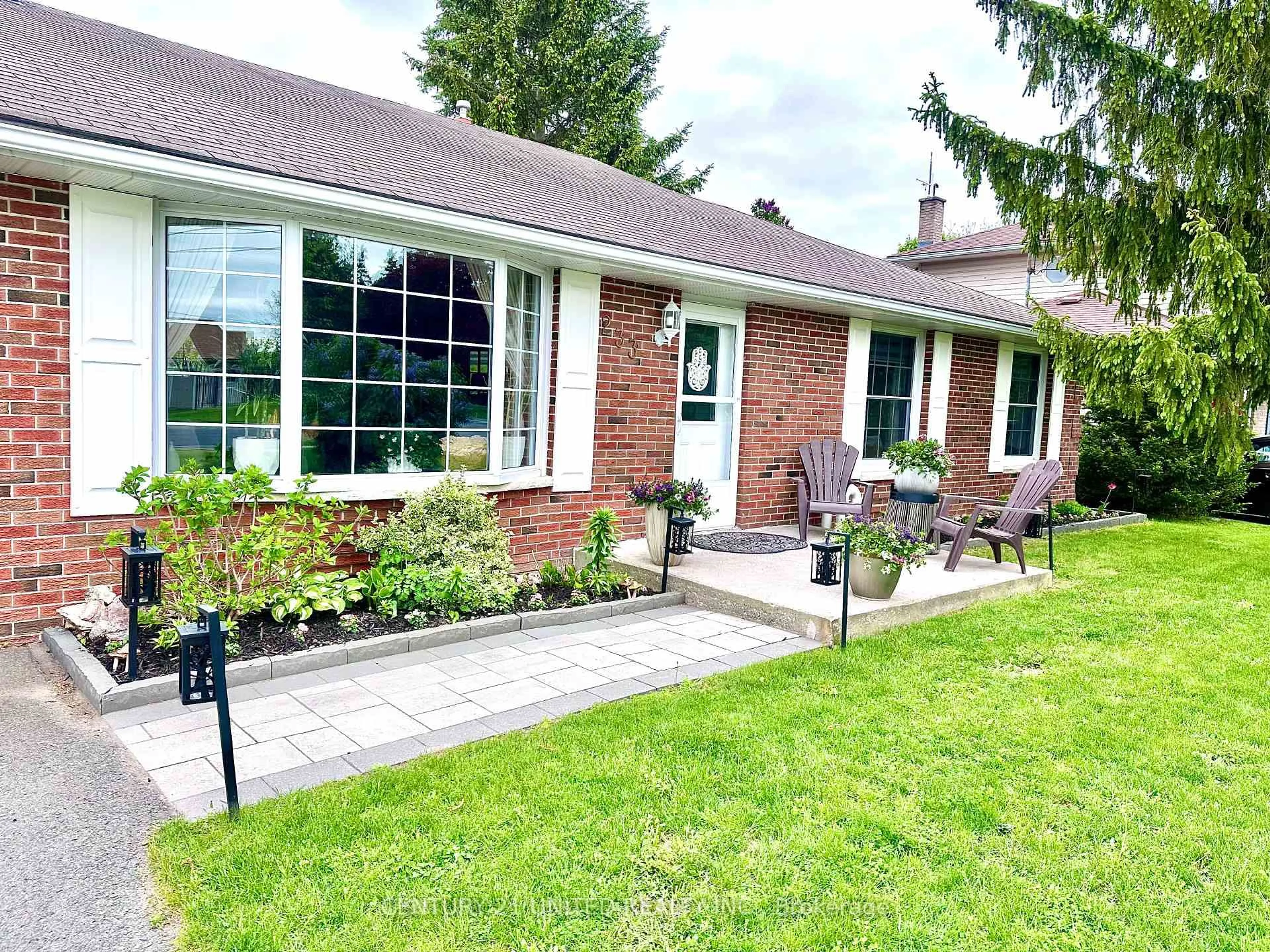 Home with brick exterior material, street for 233 Market St, Trent Hills Ontario K0L 1L0