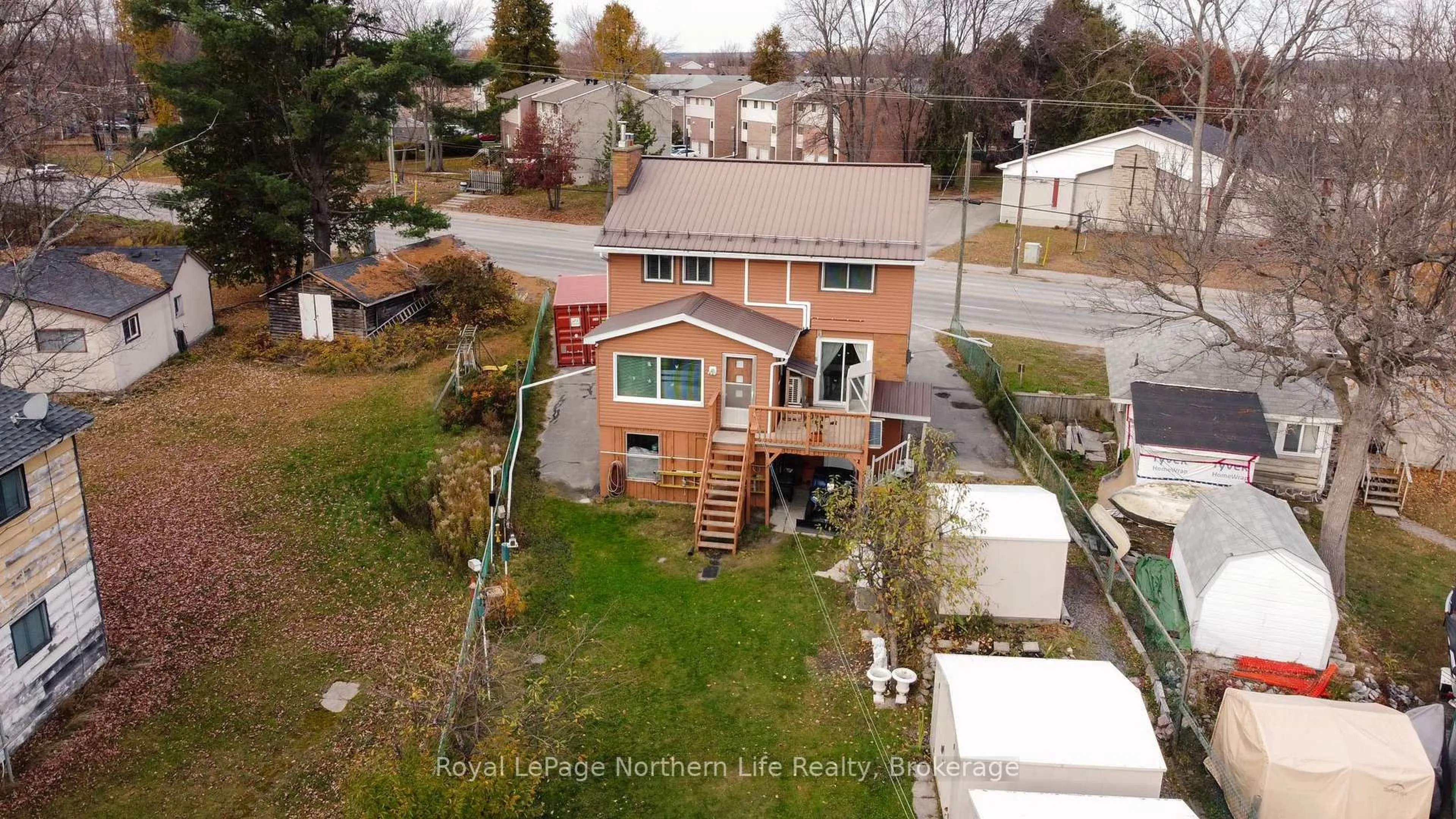 A pic from outside/outdoor area/front of a property/back of a property/a pic from drone, street for 653 Lakeshore Dr, North Bay Ontario P1A 2G1