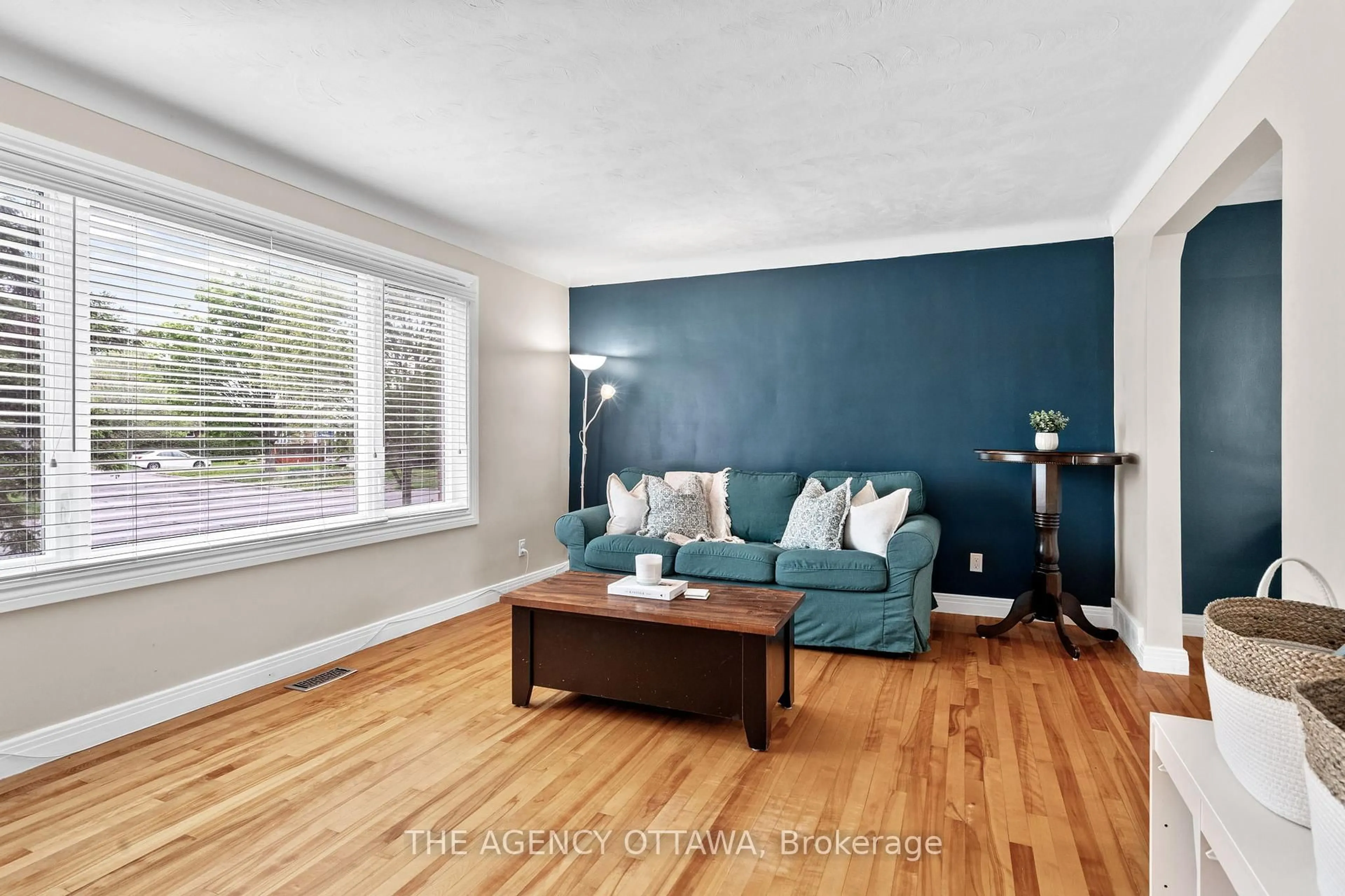 Living room with furniture, wood/laminate floor for 659 Alesther St, Ottawa Ontario K1K 1H8