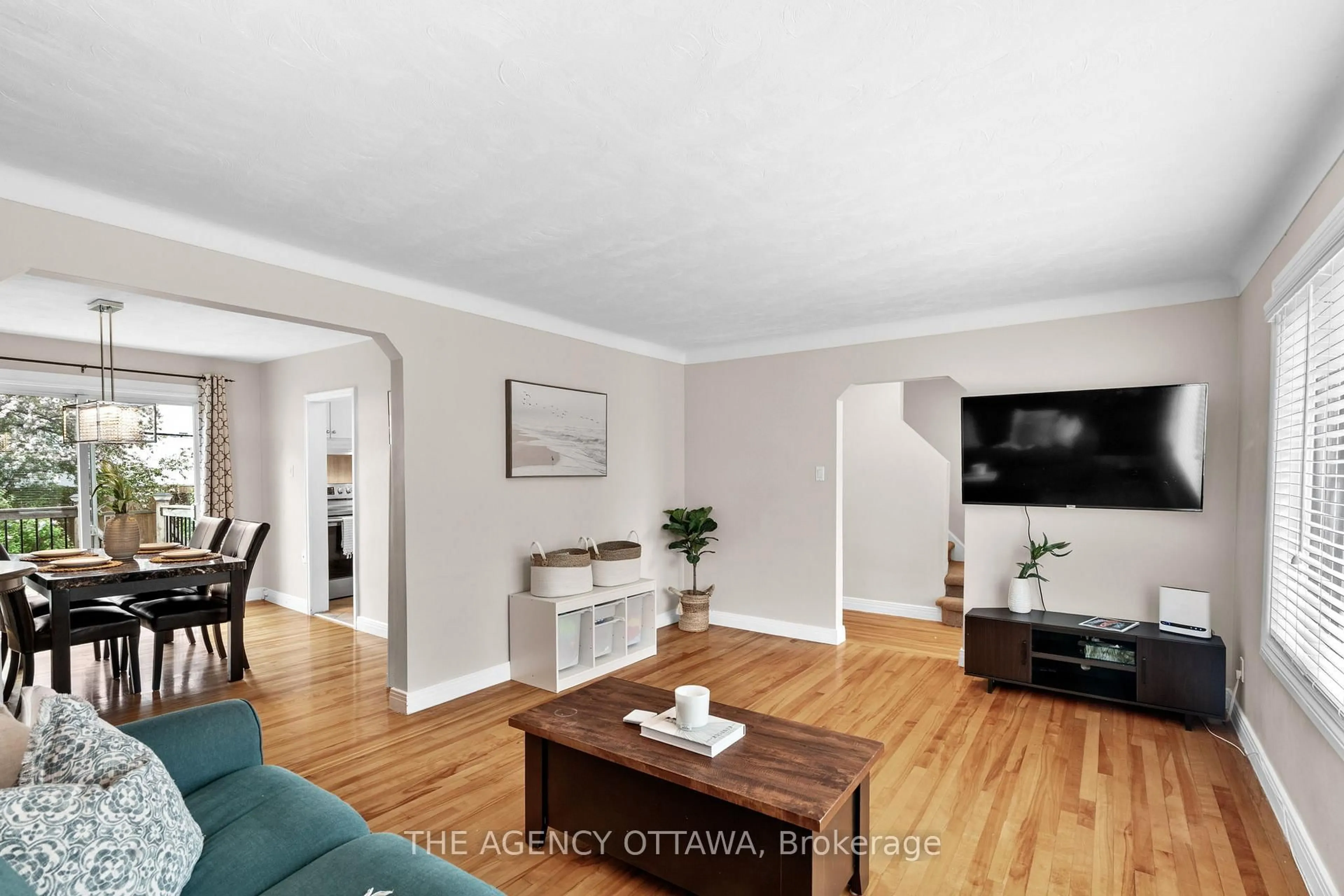 Living room with furniture, wood/laminate floor for 659 Alesther St, Ottawa Ontario K1K 1H8