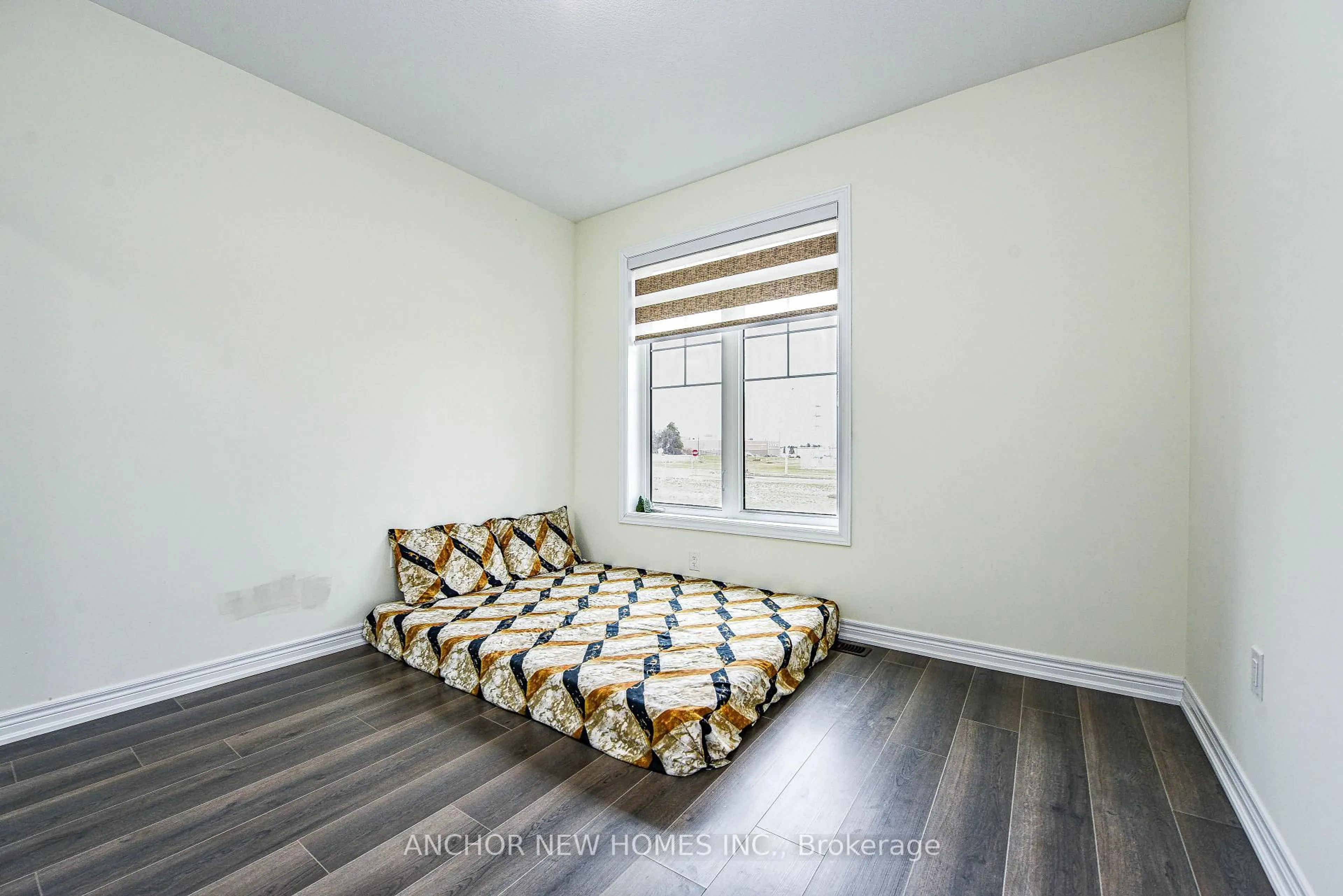 Bedroom with bed, wood/laminate floor for 10 Birmingham Dr #23, Cambridge Ontario N1R 0C6