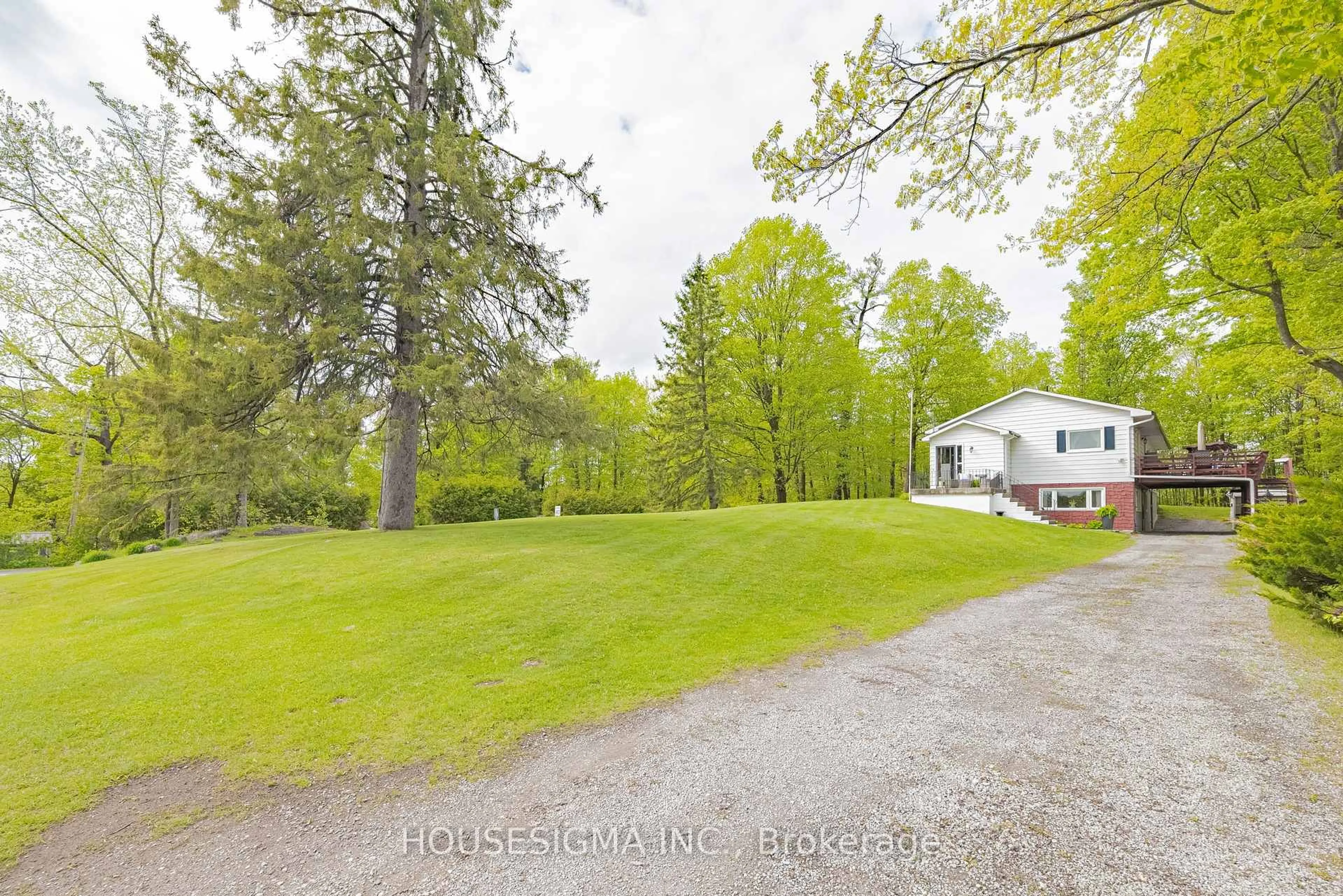 A pic from outside/outdoor area/front of a property/back of a property/a pic from drone, water/lake/river/ocean view for 7470 Highway 35, Kawartha Lakes Ontario K0M 2K0