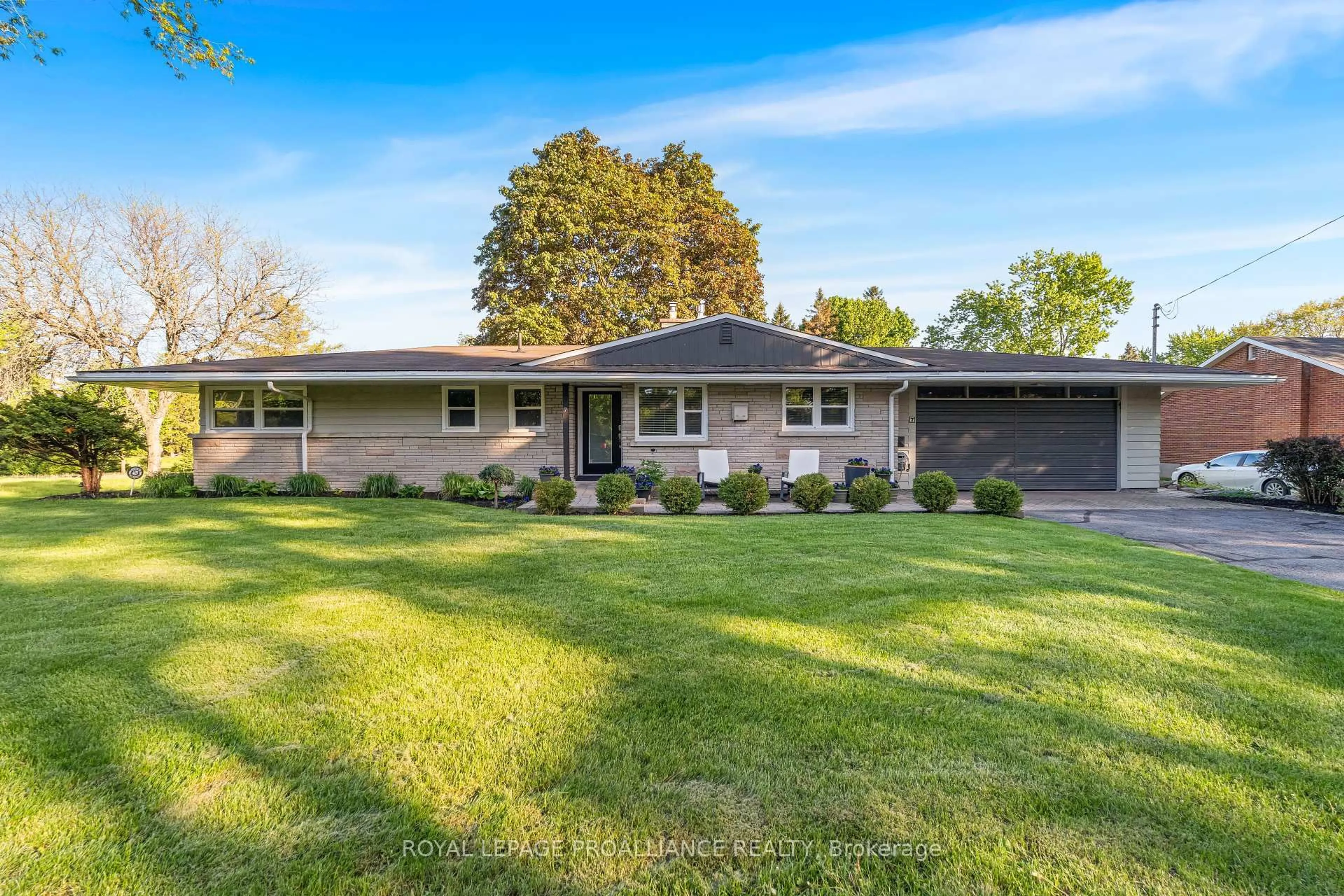 Home with vinyl exterior material, street for 7 Hutton Dr, Belleville Ontario K8P 1E9