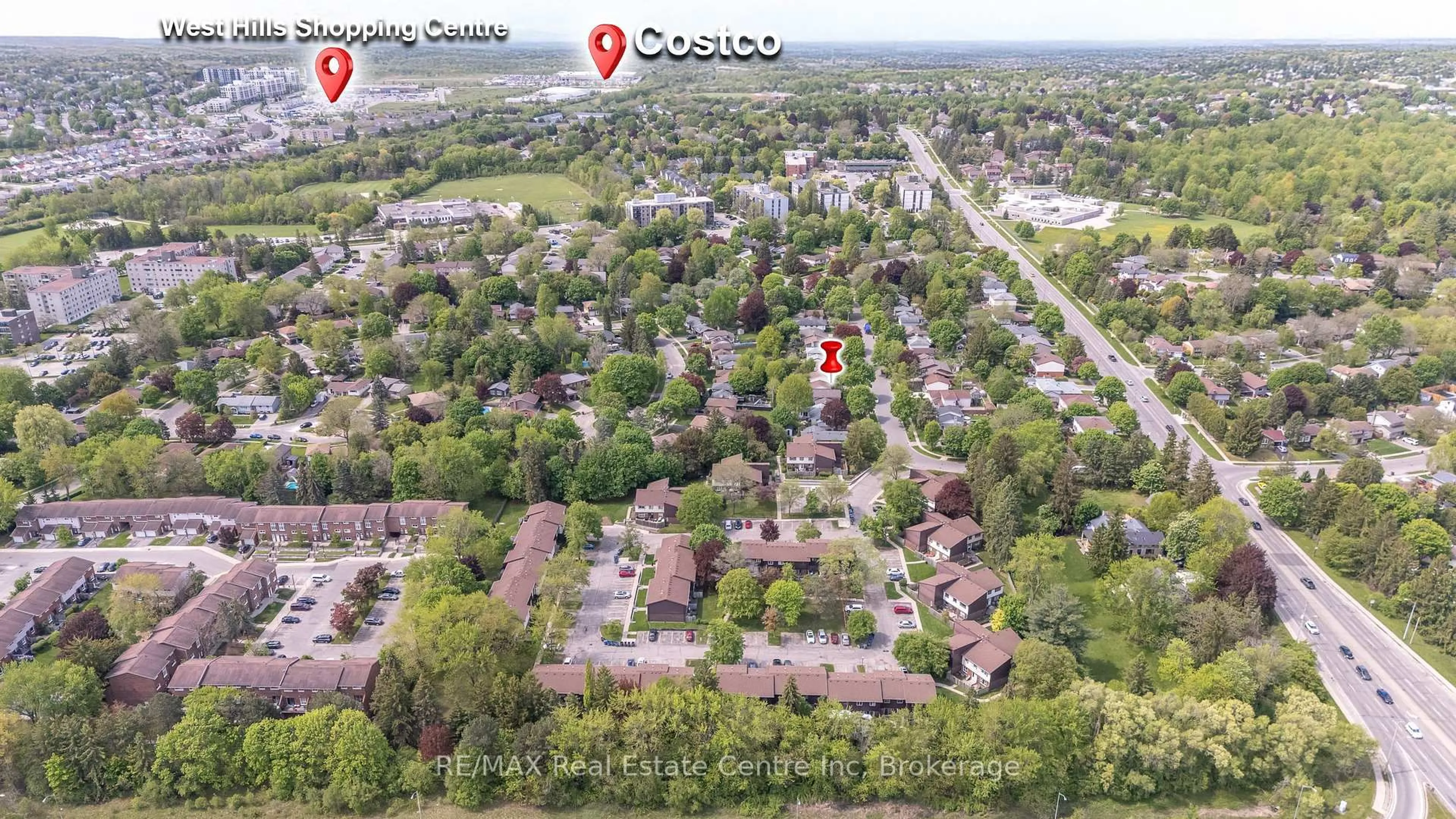 A pic from outside/outdoor area/front of a property/back of a property/a pic from drone, street for 45 Marksam Rd #1, Guelph Ontario N1H 6Y9