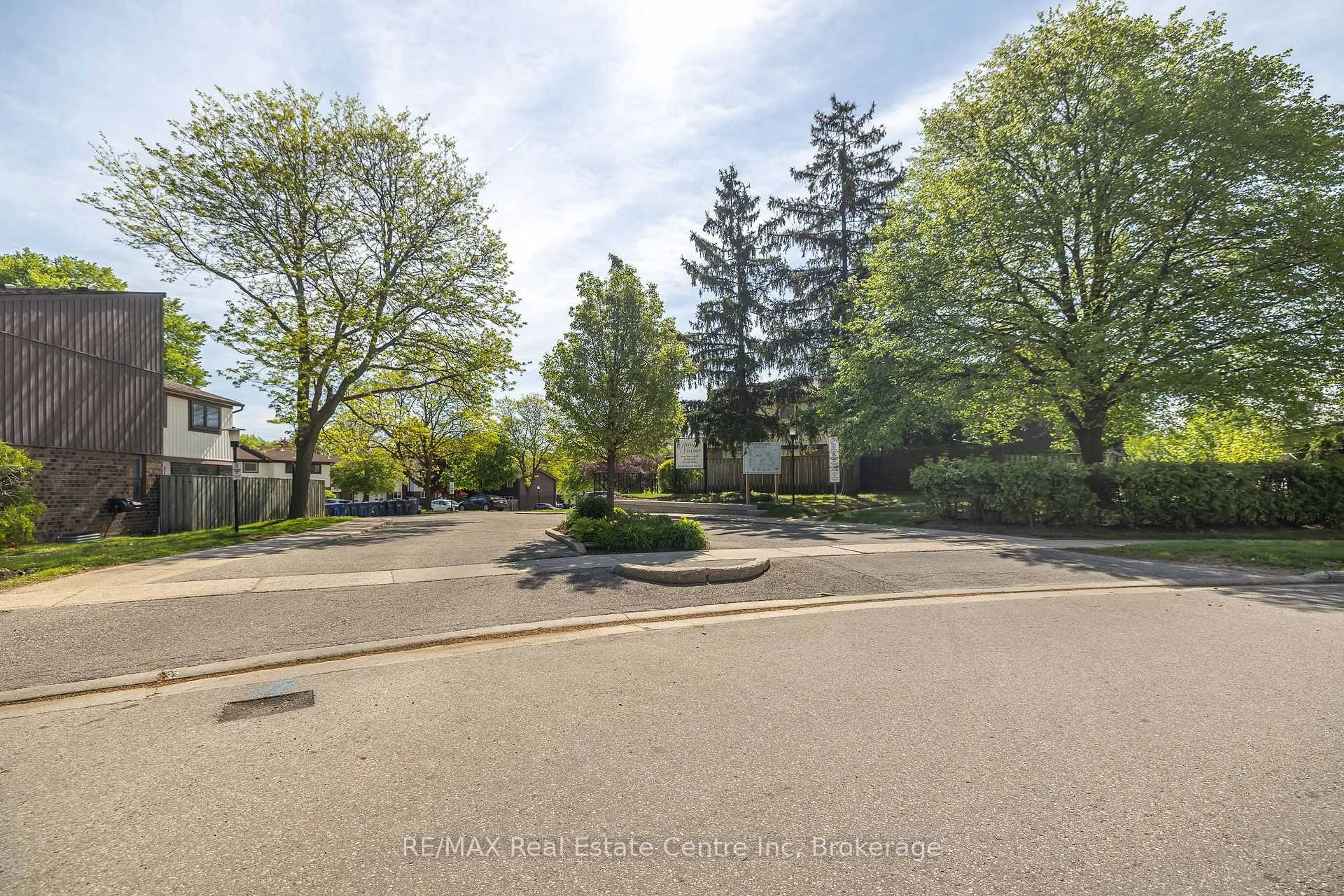 A pic from outside/outdoor area/front of a property/back of a property/a pic from drone, street for 45 Marksam Rd #1, Guelph Ontario N1H 6Y9