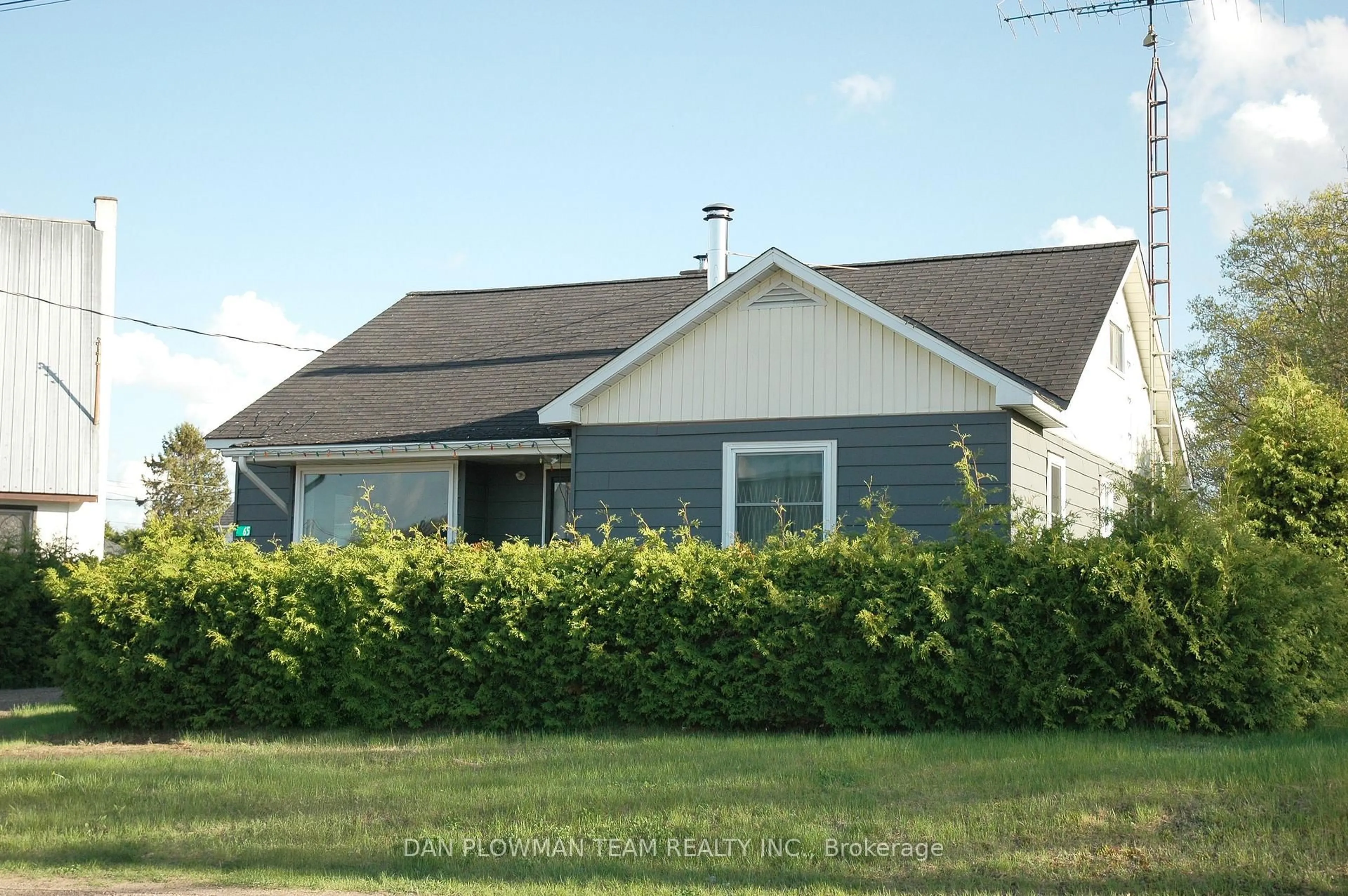 Home with vinyl exterior material, street for 65 Inglis St, Whitney Ontario K0J 2M0
