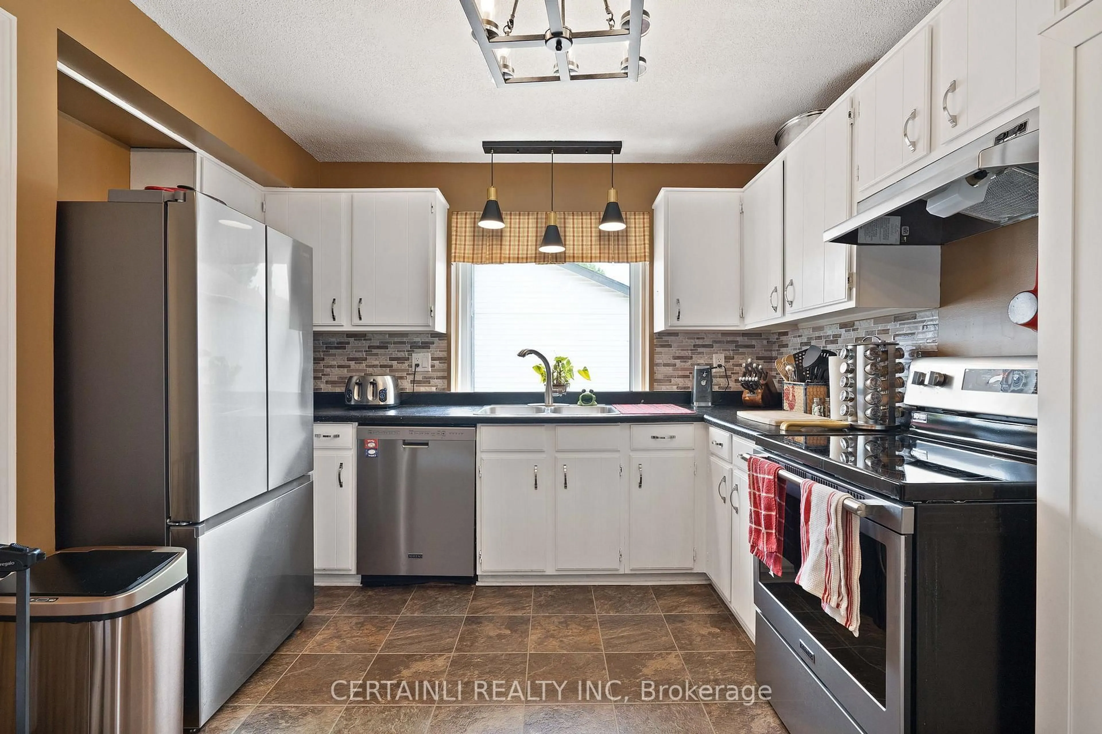 Open concept kitchen, ceramic/tile floor for 36 Dalhousie Cres, London South Ontario N6K 3N2