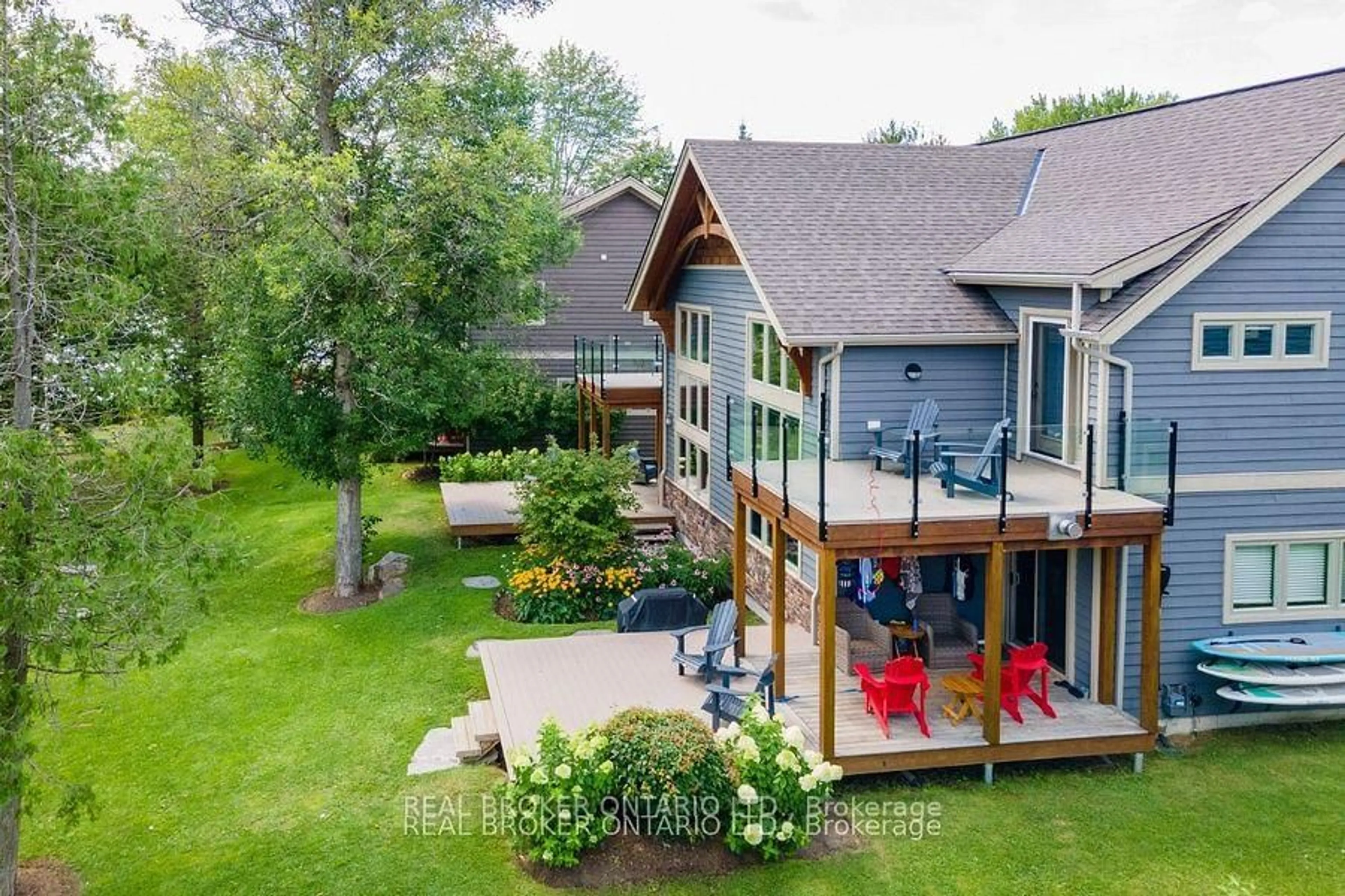 A pic from outside/outdoor area/front of a property/back of a property/a pic from drone, water/lake/river/ocean view for 1841 Muskoka Road 118 N/A #1B, Muskoka Lakes Ontario P1L 1W8