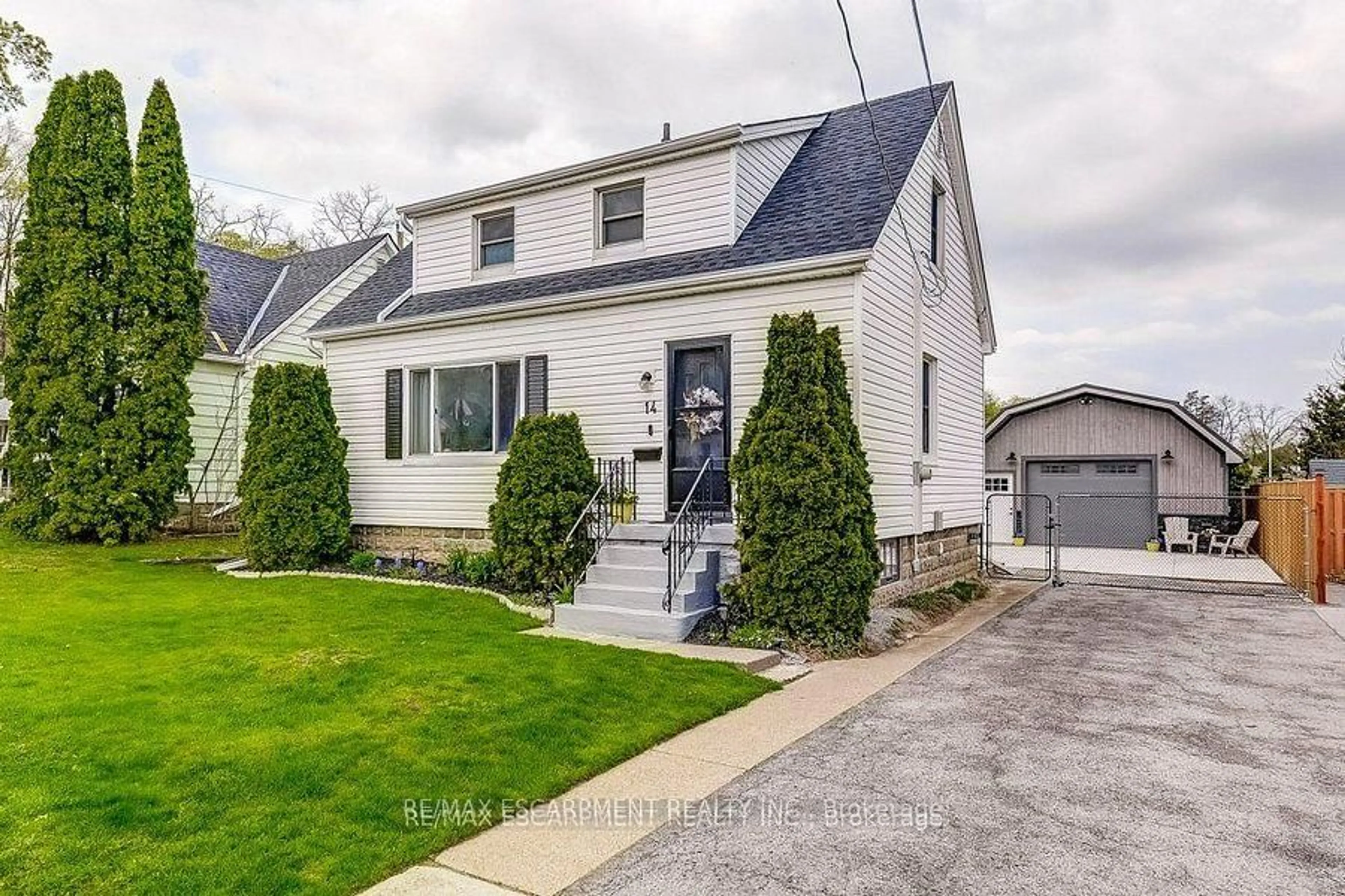 Home with vinyl exterior material, street for 14 WALKER Ave, Hamilton Ontario L8G 1S6