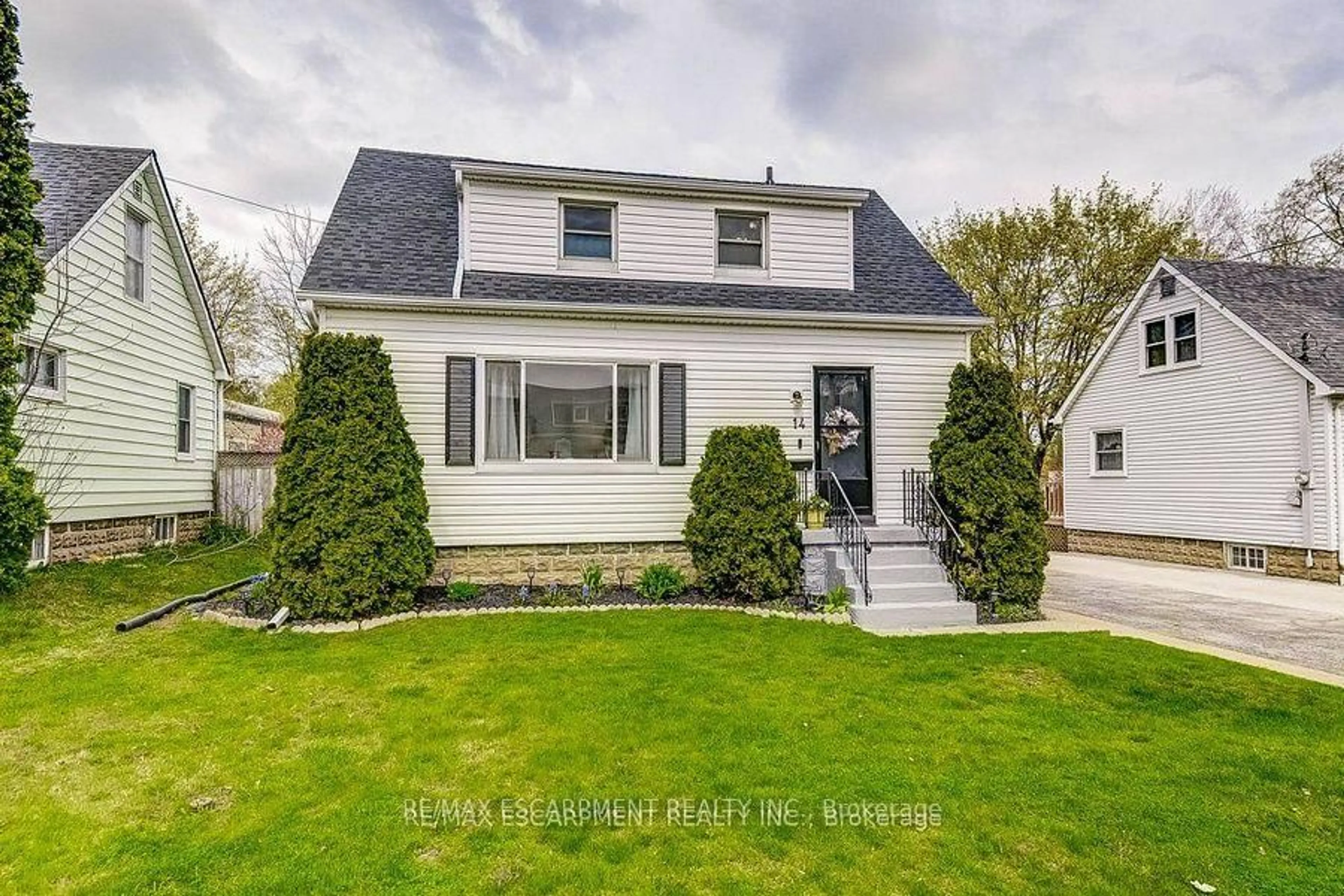 Home with vinyl exterior material, street for 14 WALKER Ave, Hamilton Ontario L8G 1S6
